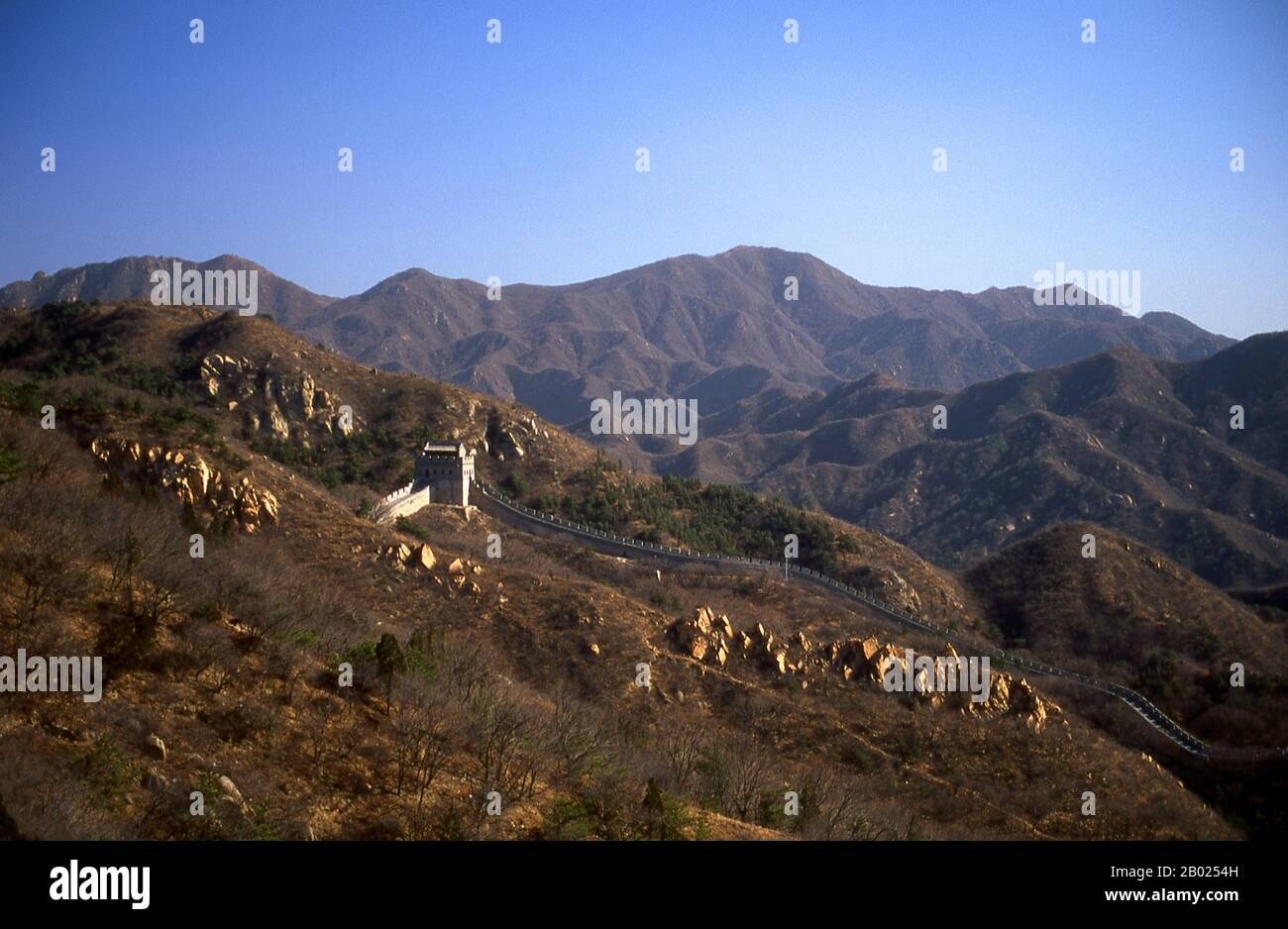 The Great Wall (Wanli Changcheng) is one of mankind's greatest achievements and dates back more than two millennia, when a series of shorter walls were systematically linked during the Qin dynasty (221–206 BCE) to protect China’s northern borders.  The Wall, originally built to keep out barbarian invaders from the north, stretches more than 5,900km (3,700 miles) from the Bohai Gulf in the Yellow Sea to Jiayuguan in the mountains of Gansu province. While the bulk of the wall is now in ruins, some sections have been repaired in recent years.  The Ming rulers, who in 1368 put an end to the alien Stock Photo