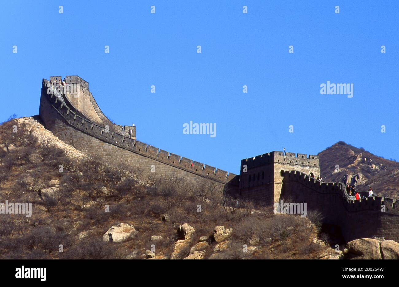 The Great Wall (Wanli Changcheng) is one of mankind's greatest achievements and dates back more than two millennia, when a series of shorter walls were systematically linked during the Qin dynasty (221–206 BCE) to protect China’s northern borders.  The Wall, originally built to keep out barbarian invaders from the north, stretches more than 5,900km (3,700 miles) from the Bohai Gulf in the Yellow Sea to Jiayuguan in the mountains of Gansu province. While the bulk of the wall is now in ruins, some sections have been repaired in recent years.  The Ming rulers, who in 1368 put an end to the alien Stock Photo