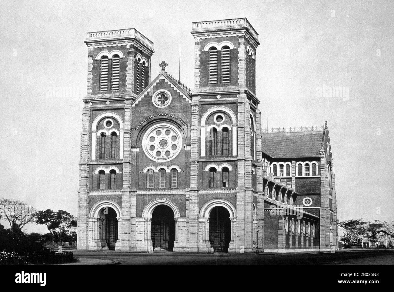 Saigon Notre-Dame Basilica, officially Basilica of Our Lady of The Immaculate Conception is a cathedral located in Ho Chi Minh City (Saigon). Established by French colonists, the cathedral was constructed between 1863 and 1880. It has two bell towers, reaching a height of 58 meters (190 feet).  Former Emperor Bảo Đại made Saigon the capital of the State of Vietnam in 1949 with himself as head of state. After the Việt Minh gained control of North Vietnam in 1954, it became common to refer to the Saigon government as 'South Vietnam'.  The government was renamed the Republic of Vietnam when Bảo Đ Stock Photo