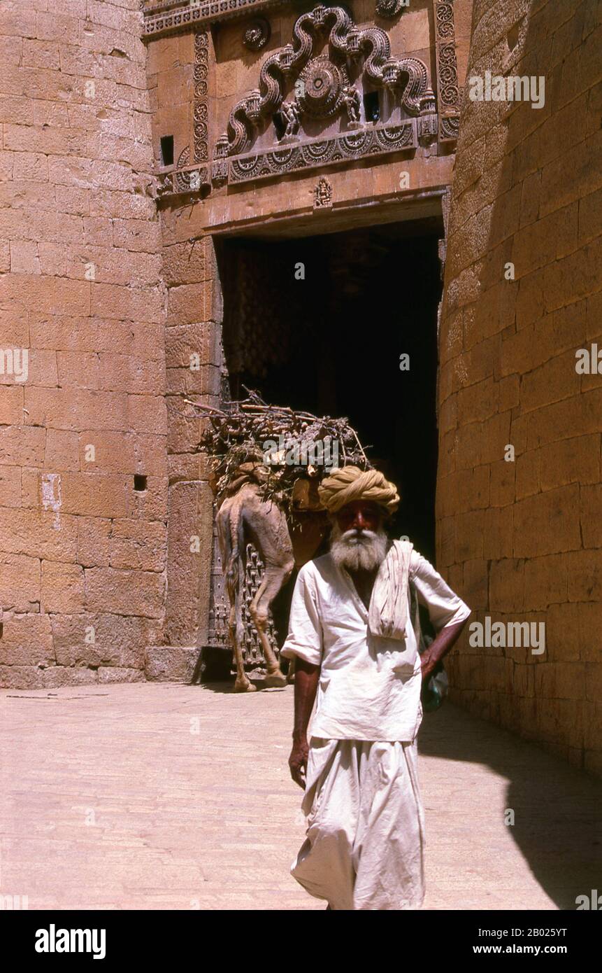 The majority of Jaisalmer's inhabitants are Bhati Rajputs, who take their name from an ancestor named Bhatti, a renowned warrior when the tribe were still located in the Punjab. Shortly after this the clan was driven southwards, and found a refuge in the Indian desert, which was henceforth its home.  Deoraj, a prince of the Bhati clan, is believed to be the real founder of the Jaisalmer dynasty. In 1156 Rawal Jaisal, the sixth in succession from Deoraj, founded the fort and city of Jaisalmer, and made it his capital as he moved from his former capital at Lodhruva (situated about 15 km to the n Stock Photo