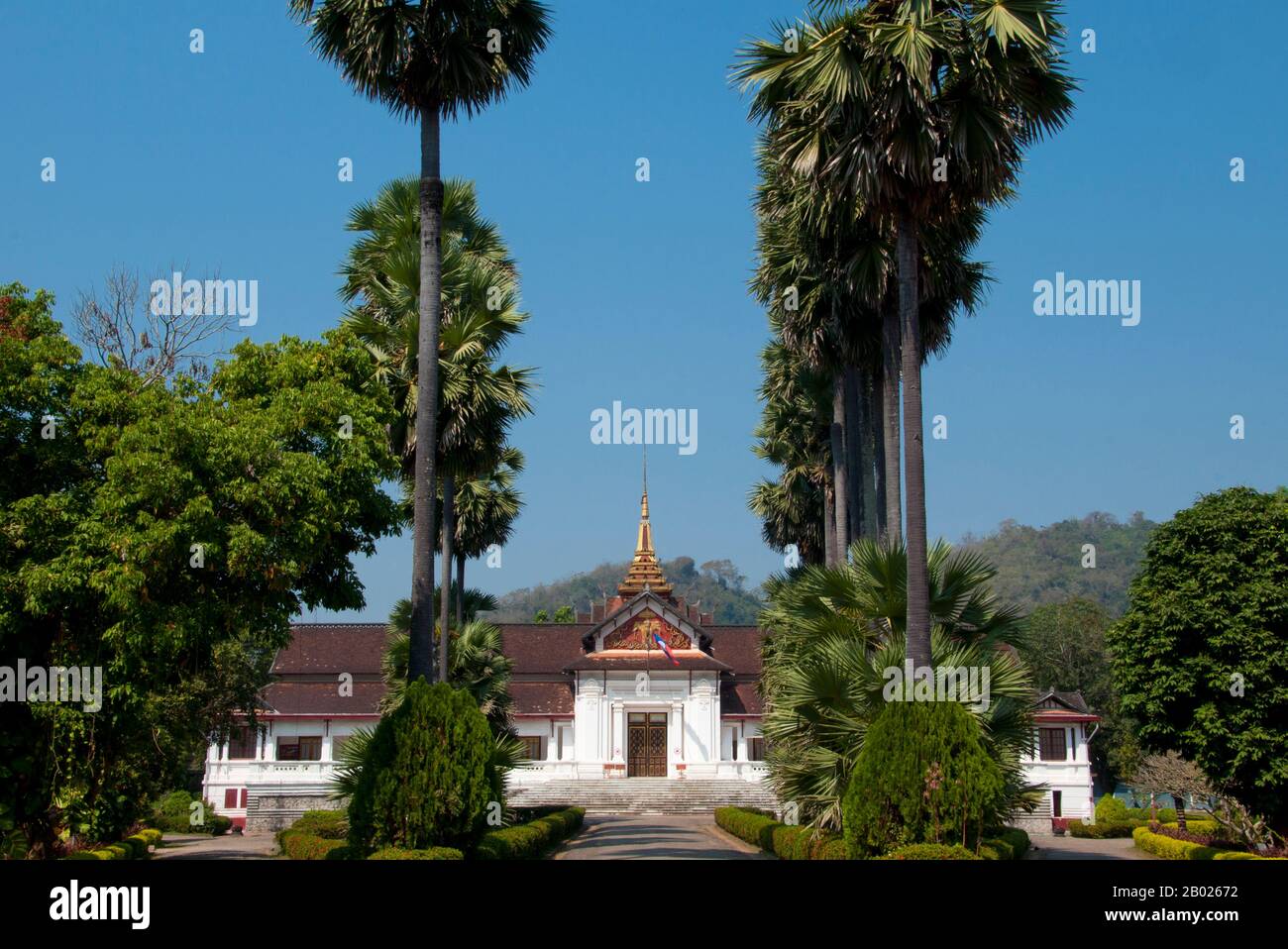 The Royal Palace (official name Haw Kham) in Luang Prabang, Laos, was built in 1904 during the French colonial era for King Sisavang Vong and his family. The site for the palace was chosen so that official visitors to Luang Prabang could disembark from their river voyages directly below the palace and be received there. After the death of King Sisavang Vong, the Crown Prince Savang Vatthana and his family were the last to occupy the grounds.  In 1975, the monarchy was overthrown by the communists and the Royal Family were taken to re-education camps. The palace was then converted into a nation Stock Photo