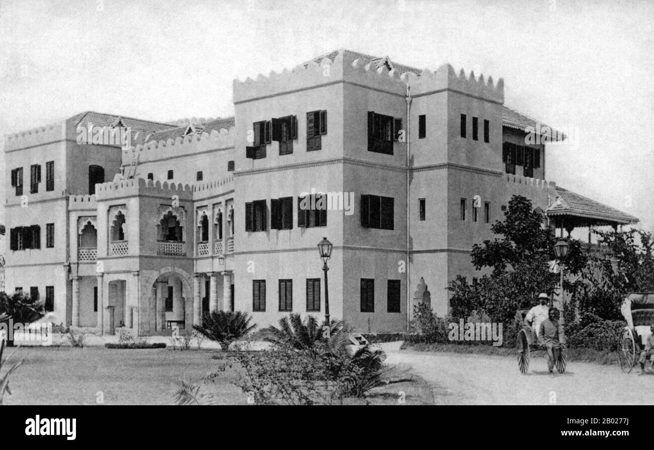 Tanzania/Zanzibar: The British Residence (now the Presidential Residence) first built in 1903, c. 1930.  Zanzibar is a semi-autonomous part of Tanzania in East Africa. It is composed of the Zanzibar Archipelago in the Indian Ocean, 25-50 kms (16-31 mi) off the coast of the mainland, and consists of numerous small islands and two large ones: Unguja (the main island, referred to informally as Zanzibar) and Pemba.  The capital of Zanzibar, located on the island of Unguja, is Zanzibar City. Its historic centre, known as Stone Town, is a World Heritage Site. Stock Photo