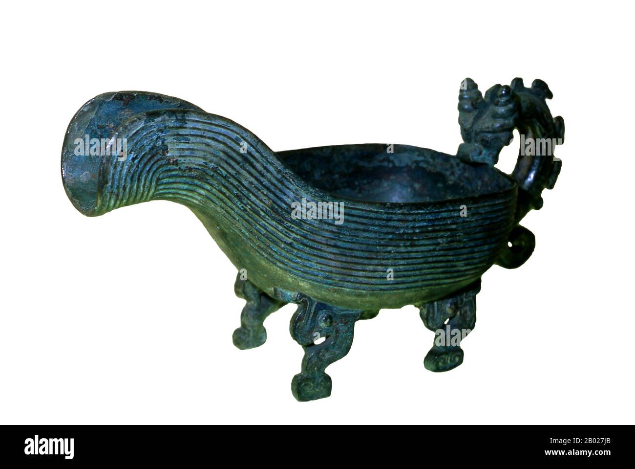 A yi (Chinese: 匜; pinyin: yí) is a shape used in ancient Chinese ritual bronzes. It has the shape of half a gourd with a handle (often in the shape of a dragon) and usually supported by four legs. It is believed it was used to contain water for washing hands before rituals like sacrifices. Stock Photo