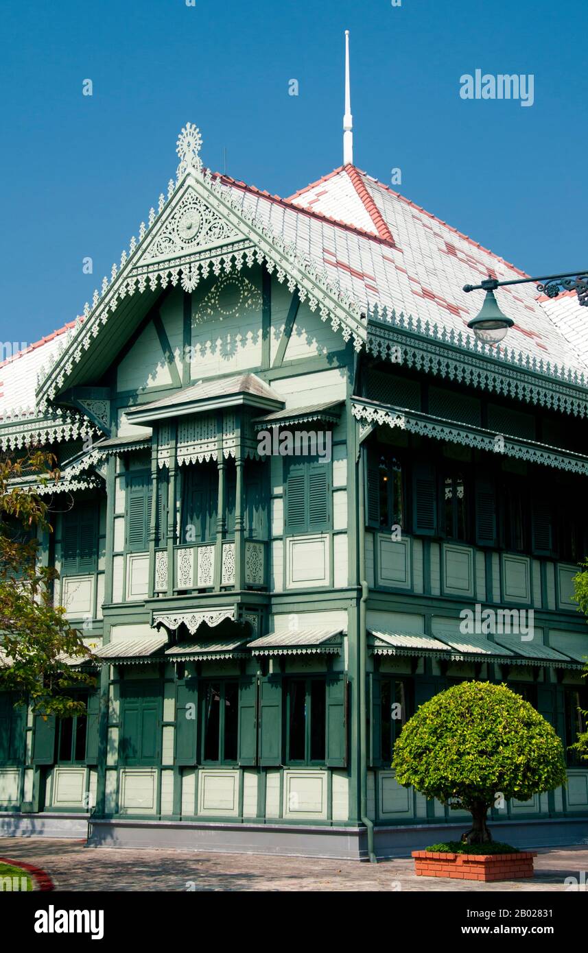 The Suan Hong Residential Hall was originally built by King Chulalongkorn (Rama V) for his grandmother, Queen Savang Vadhana. This old wooden two storey building now houses pictures portraying key events in the life of King Bhumibol Adulyadej (Rama IX), the present King of Thailand.  The Vimanmek Mansion is a former royal palace and is also known as the Vimanmek Teak Mansion or Vimanmek Palace.  Vimanmek Mansion was built in 1900 by King Rama V (King Chulalongkorn) by having the Munthatu Rattanaroj Residence in Chuthathuj Rachathan at Ko Sichang, Chonburi, dismantled and reassembled in Dusit G Stock Photo
