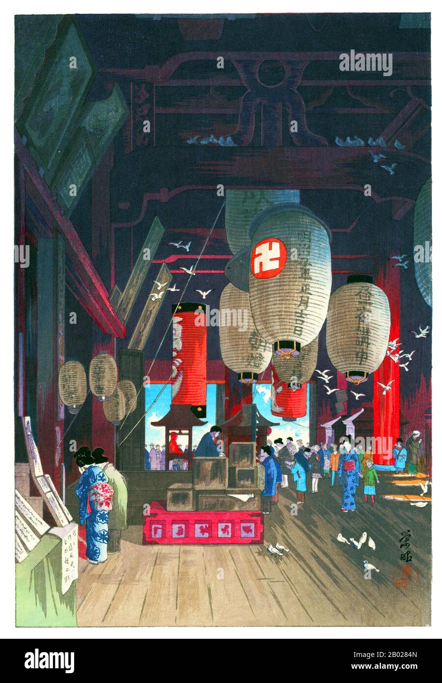 Japan: Interior of the Kannon Temple at Asakusa (Asakusa Kannon-dô no naidô). Ukiyo-e woodblock print by Narazaki Eisho (1864-1936), 1932.  Narazaki Eishō used the art names Fuyō (1916-1922) and Eishō (1922-1936). He learned the art of woodblock printing from Eitoku Kobayashi and while working at the Printing Bureau of the Ministry of Finance in Tokyo, he learned copperplate printing from the Director, the Italian artist Eduardo Chiossone.  In 1916 he began making prints for a foreign clientele under the pseudonym of Fuyō. Stock Photo