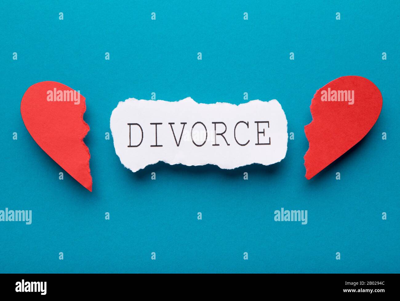 Broken heart and divorce text over blue Stock Photo - Alamy