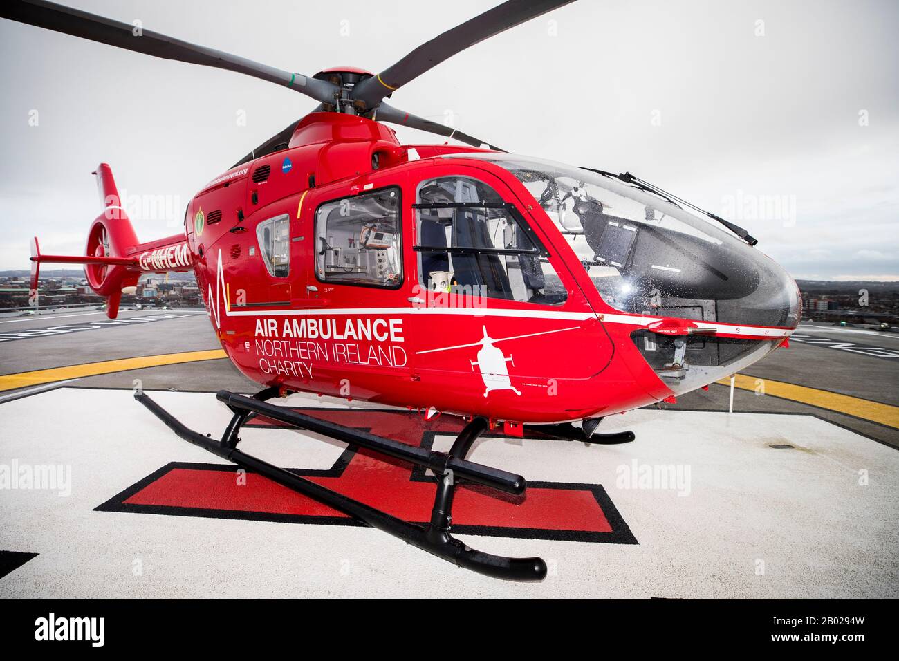 An air ambulance used by the Northern Ireland Helicopter Emergency Medical Service (HEMS) on the helipad at the Royal Victoria Hospital in West Belfast, where the first test landing of an air ambulance took place on Tuesday. Stock Photo