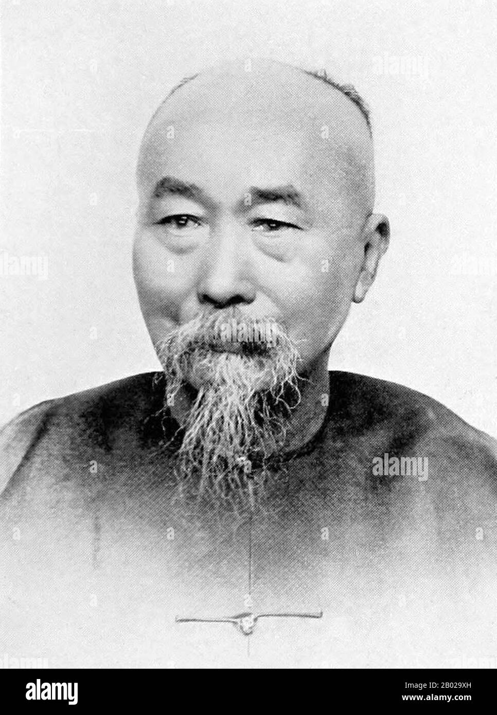 Li Hongzhang (Wade–Giles: Li Hung-chang), Marquis Suyi of the First Class (February 15, 1823 – November 7, 1901), was a Chinese civilian official who ended several major rebellions, and a leading statesman of the late Qing Empire. He served in important positions of the Imperial Court, once holding the office of the Viceroy of Zhili.  Although he was best known in the West for his diplomatic negotiation skills, after the 1894 First Sino-Japanese War, Li became a symbol in China for late Qing-dynasty Chinese weakness vis-a-vis foreign powers. His image in China remains largely controversial, wi Stock Photo