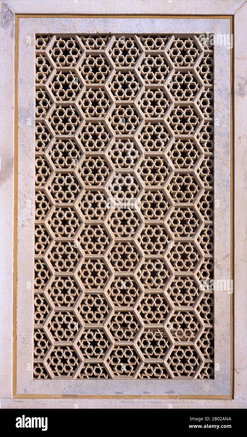 A jali (or jaali, Gujarati જાળી) is the term for a perforated stone or latticed screen, usually with an ornamental pattern constructed through the use of calligraphy and geometry. Early work was performed by carving into stone, while the later used by the Mughals employed the technique of inlay, using marble and semi-precious stones. Jali typically use Floral geometric patterns.  Etimad-ud-Daula's Tomb (Urdu: اعتماد الدولہ کا مقبرہ, I'timād-ud-Daulah kā Maqbara) is a Mughal mausoleum in the city of Agra in the Indian state of Uttar Pradesh.  Along with the main building, the structure consist Stock Photo