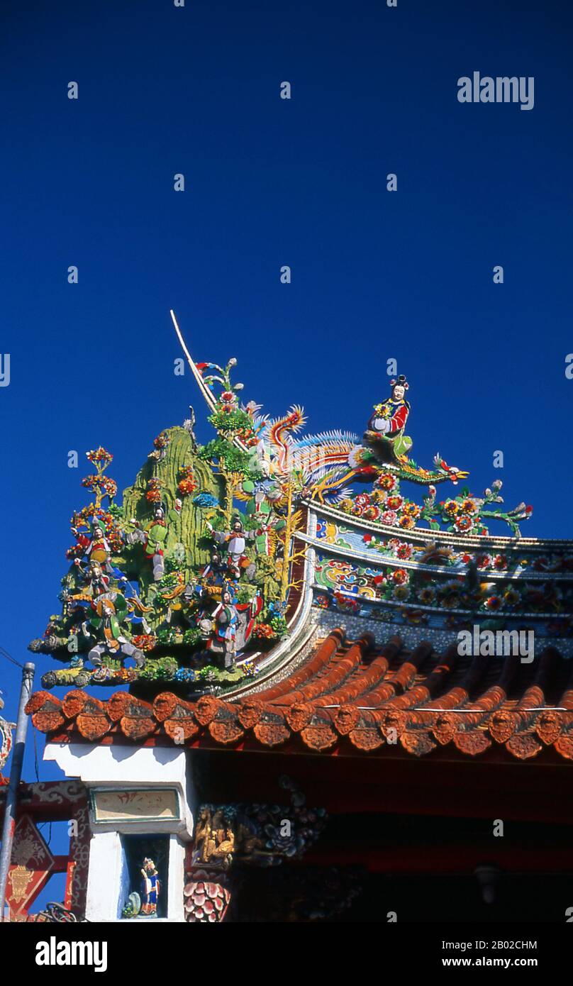 The Chengguangao Matsu Temple is dedicated to Matsu, goddess of the sea. Mazu (Wade–Giles: Matsu, Vietnamese: Ma To) is the indigenous goddess of the sea who is said to protect fishermen and sailors, and is invoked as the patron saint of all Southern Chinese and East Asian persons.  Born as Lin Moniang in Fujian around 960 CE, worship of Mazu began around the Ming Dynasty, when many temples dedicated to her were erected all across Mainland China, later spreading to other countries with Overseas Chinese populations.  Mazu is widely worshipped in the south-eastern coastal areas of China and neig Stock Photo