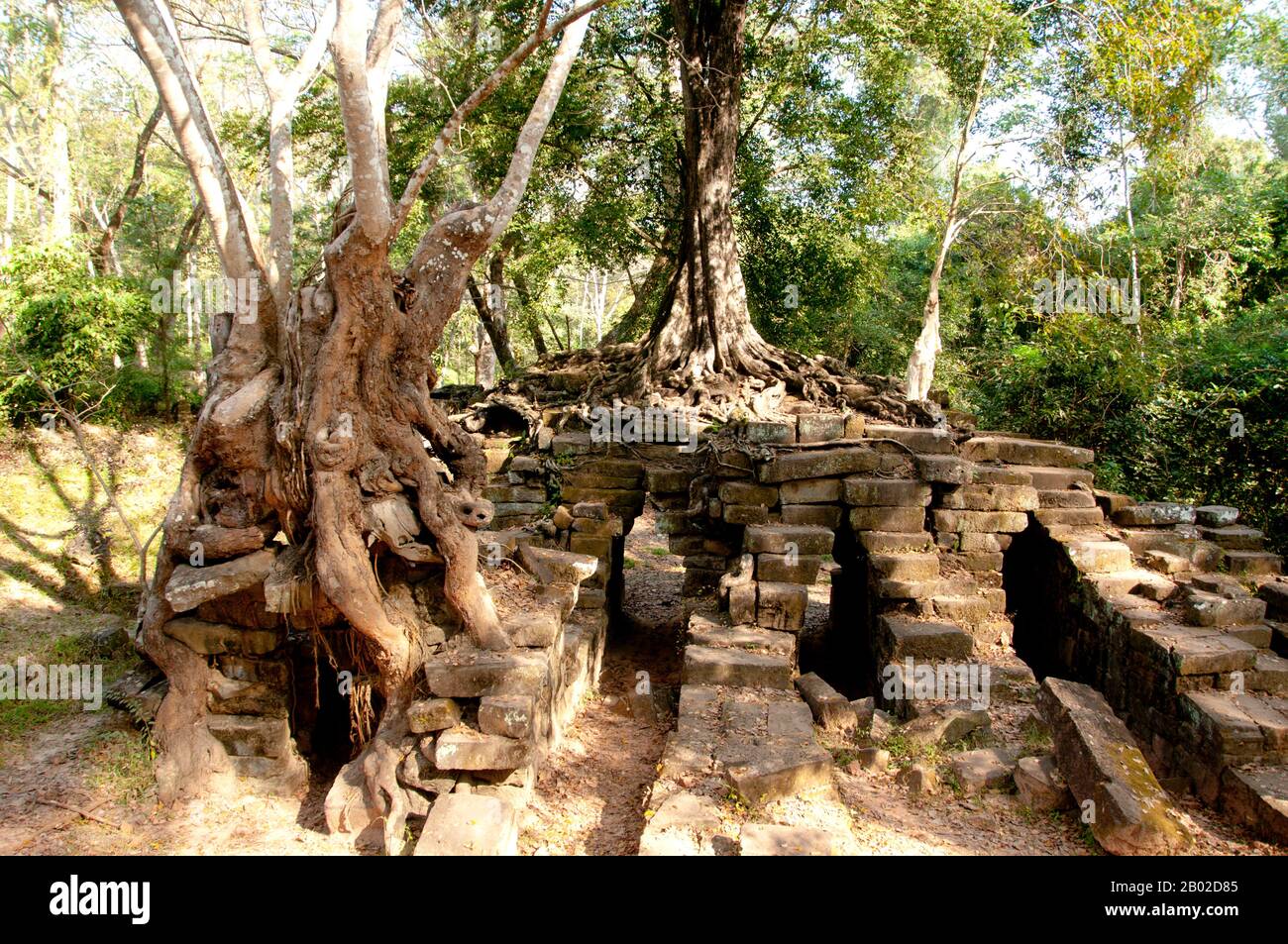 Cambodia: Spean Thma, a stone Khmer bridge between the Victory gate of Angkor Thom and the temple of Ta Keo, Angkor.  Spean Thma is known as the bridge of stone and it is located west of Ta Keo. It is one of the few Khmer Empire era bridges to have survived to the modern day.  It was built on the former path of the Siem Reap River between Angkor Thom and the Eastern Baray and it was probably rebuilt after the Khmer period (around the 15th century), as it includes many reused sandstone blocks. Stock Photo