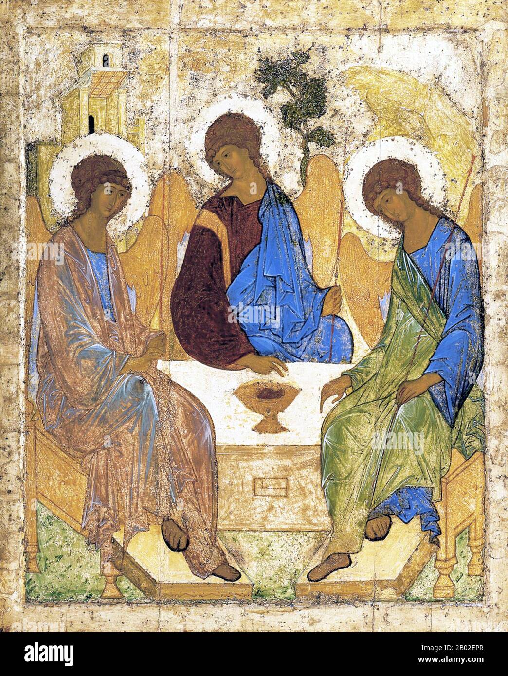 Trinity (Russian: Троица, also called 'Rublev's Trinity') is a Holy Trinity Icon, believed to have been created by Russian painter Andrei Rublev in the 15th century. It is his most famous work, as well regarded as one of the highest achievements of Russian art. Trinity depicts the three angels who visited Abraham at the oak of Mamre (see Genesis 18,1-15), but the painting is full of symbolism and often interpreted as an icon of the Holy Trinity.  The original is currently held in the Tretyakov Gallery in Moscow. It was commissioned in honor of the abbot Sergius of the Troitse-Sergiyeva Lavra, Stock Photo
