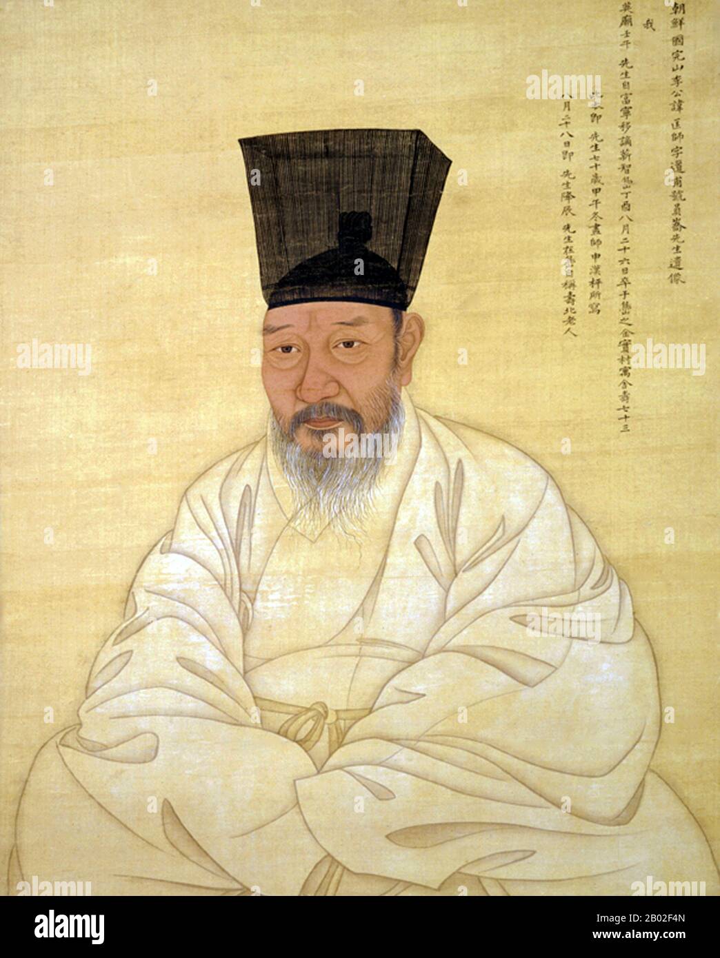 Yi Gwang-sa was one of the leading calligraphers of the Joseon period. He created a calligraphy style, called the 'Wongyo style' after his pen name, in an effort to establish an independent Korean style.  The colophon at top right reveals the portrait was painted in 1775, when Yi was 70 years old, by court painter Shin Han-pyeong, father of the famous genre painter Shin Yun-bok. Stock Photo