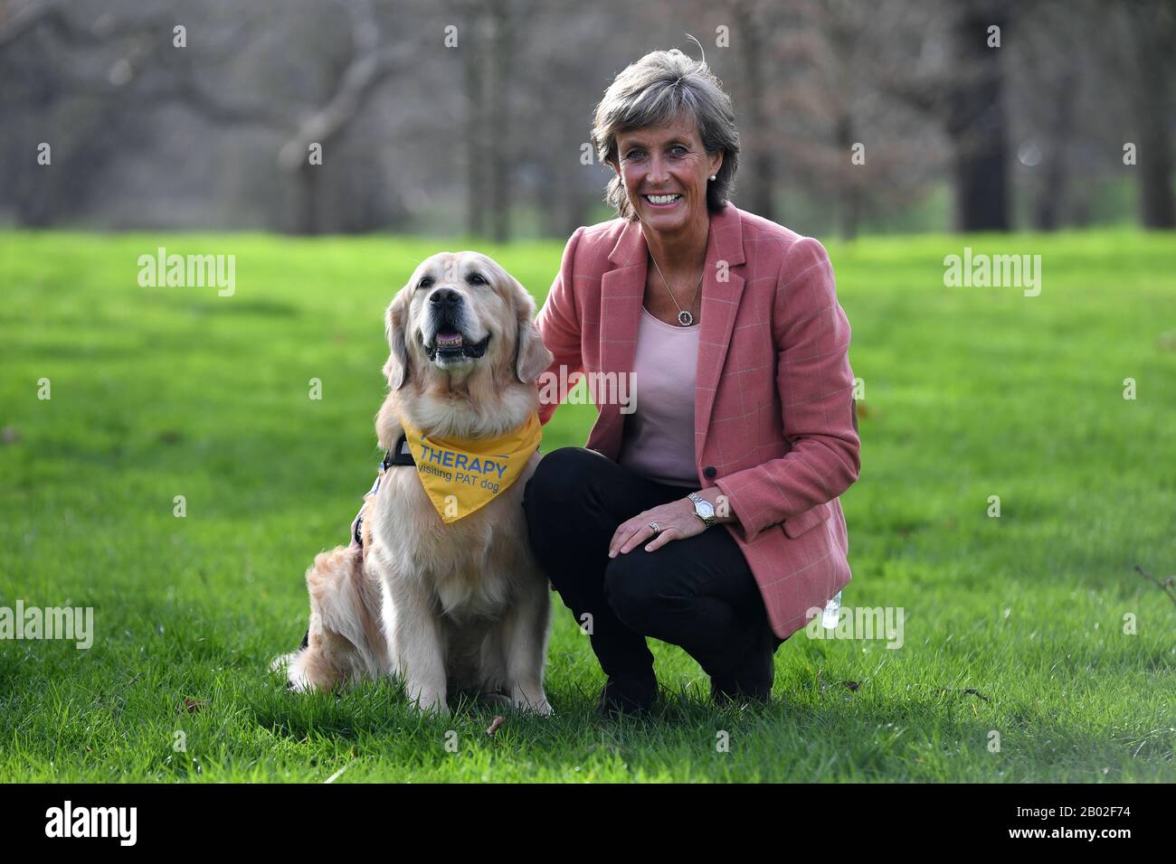 Lyndsey Uglow with her dog Leo, one of the finalists for Friends for Life 2020, at a launch event for this year's Crufts and Friends for Life in Green Park, London. Stock Photo