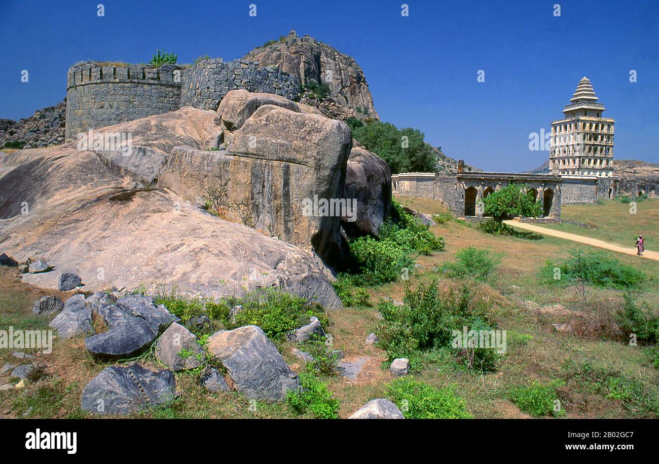 India: Fortifications and tower at Gingee Fort, Tamil Nadu. Gingee Fort or Senji Fort was originally the site of a small fort built by the Chola dynasty during the 9th century. The fort was modified by Kurumbar during the 13th century.  The fort as it stands today was built in the 15th and 16th centuries by the Nayak Dynasty. The fort passed variously to the Marathas under the leadership of Shivaji in 1677, the Bijapur sultans, the Moghuls, Carnatic Nawabs, the French and then the British in 1761. The fort is closely associated with Raja Tej Singh. Stock Photo