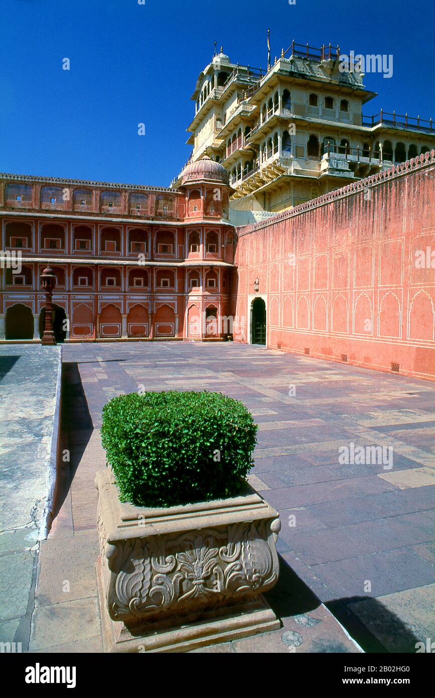 The City Palace was built between 1729 and 1732, initially by Maharaja Sawai Jai Singh II. He planned and built the outer walls, and later additions were made by successive rulers right up to the 20th century.  Jaipur is the capital and largest city of the Indian state of Rajasthan. It was founded on 18 November 1727 by Maharaja Sawai Jai Singh II, the ruler of Amber, after whom the city was named. The city today has a population of 3.1 million. Jaipur is known as the Pink City of India.  The city is remarkable among pre-modern Indian cities for the width and regularity of its streets which ar Stock Photo