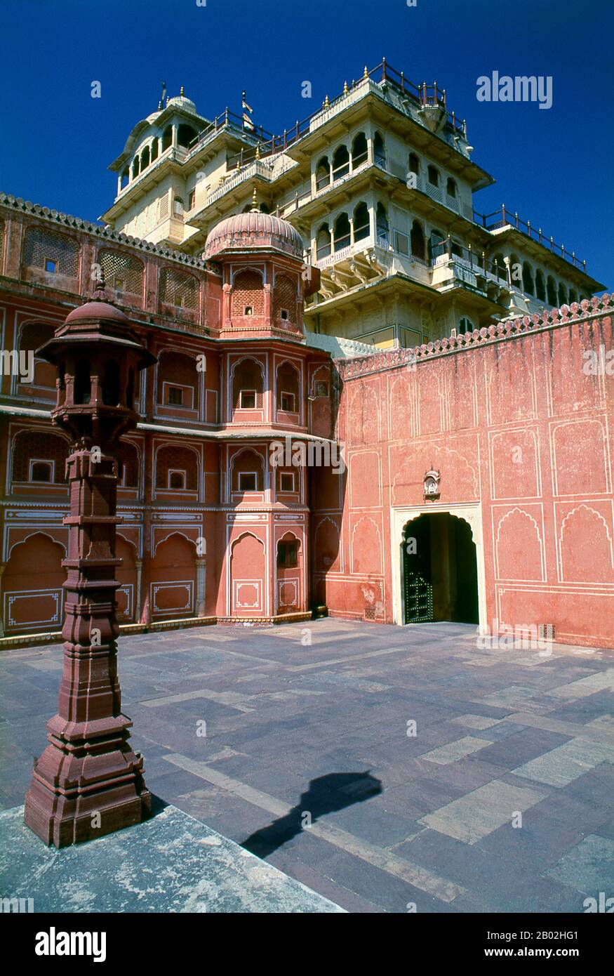 The City Palace was built between 1729 and 1732, initially by Maharaja Sawai Jai Singh II. He planned and built the outer walls, and later additions were made by successive rulers right up to the 20th century.  Jaipur is the capital and largest city of the Indian state of Rajasthan. It was founded on 18 November 1727 by Maharaja Sawai Jai Singh II, the ruler of Amber, after whom the city was named. The city today has a population of 3.1 million. Jaipur is known as the Pink City of India.  The city is remarkable among pre-modern Indian cities for the width and regularity of its streets which ar Stock Photo