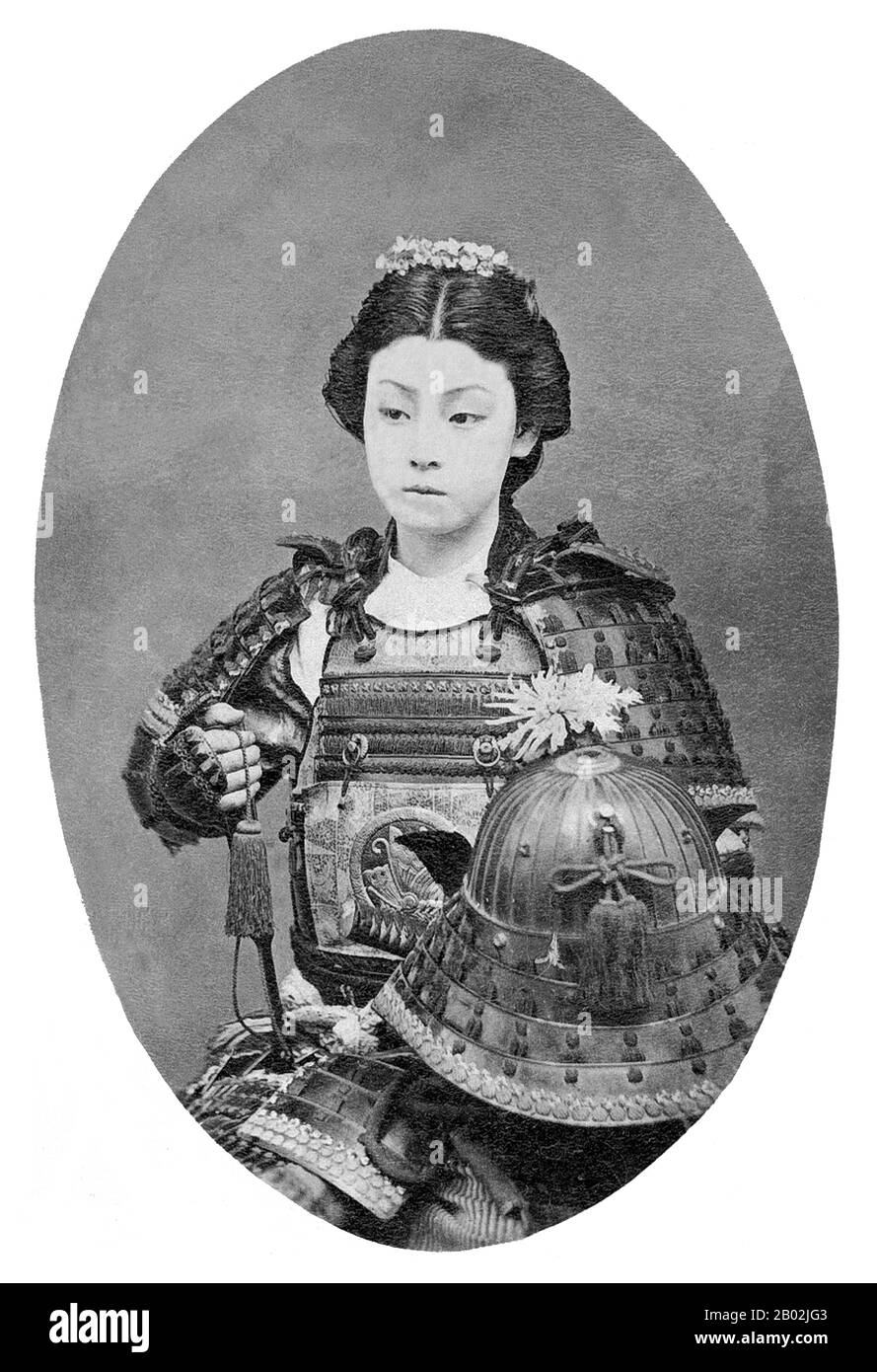 An onna-bugeisha (女武芸者) was a type of female warrior belonging to the Japanese upper class. Many wives, widows, daughters, and rebels answered the call of duty by engaging in battle, commonly alongside samurai men. They were members of the bushi (samurai) class in feudal Japan and were trained in the use of weapons to protect their household, family, and honour in times of war.   They also represented a divergence from the traditional 'housewife' role of the Japanese woman. They are sometimes referred to as female samurai. Significant icons such as Empress Jingu, Tomoe Gozen, Nakano Takeko, an Stock Photo