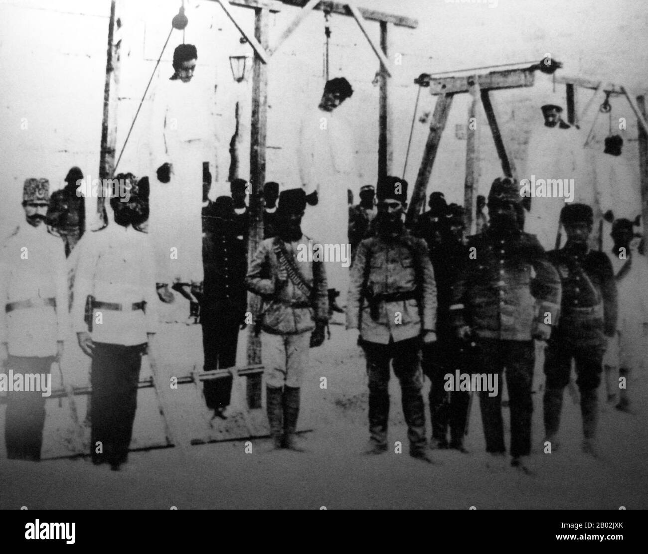 Syria / Turkey / Armenia: Armenian doctors hanged in public at Haleb / Aleppo, 1916. The Armenian Genocide refers to the deliberate and systematic destruction of the Armenian population of the Ottoman Empire during and just after World War I. It was implemented through wholesale massacres and deportations, with the deportations consisting of forced marches under conditions designed to lead to the death of the deportees. The total number of resulting Armenian deaths is generally held to have been between one and one and a half million. Stock Photo