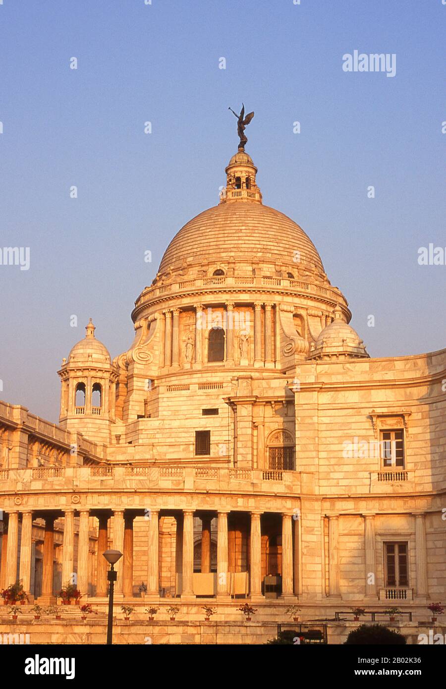The Victoria Memorial Hall was built between 1906 and 1921 and is dedicated to the memory of Queen Victoria (1819–1901), Empress of India. The memorial was built in an Indo-Saracenic revivalist style and the architect was William Emerson (1843 - 1924).  The tax records of Mughal Emperor Akbar (1584–1598) as well as the work of a 15th century Bengali poet, Bipradaas, both mention a settlement named Kalikata (thought to mean ‘Steps of Kali’ for the Hindu goddess Kali) from which the name Calcutta is believed to derive.  In 1690 Job Charnock, an agent of the East India Company, founded the first Stock Photo