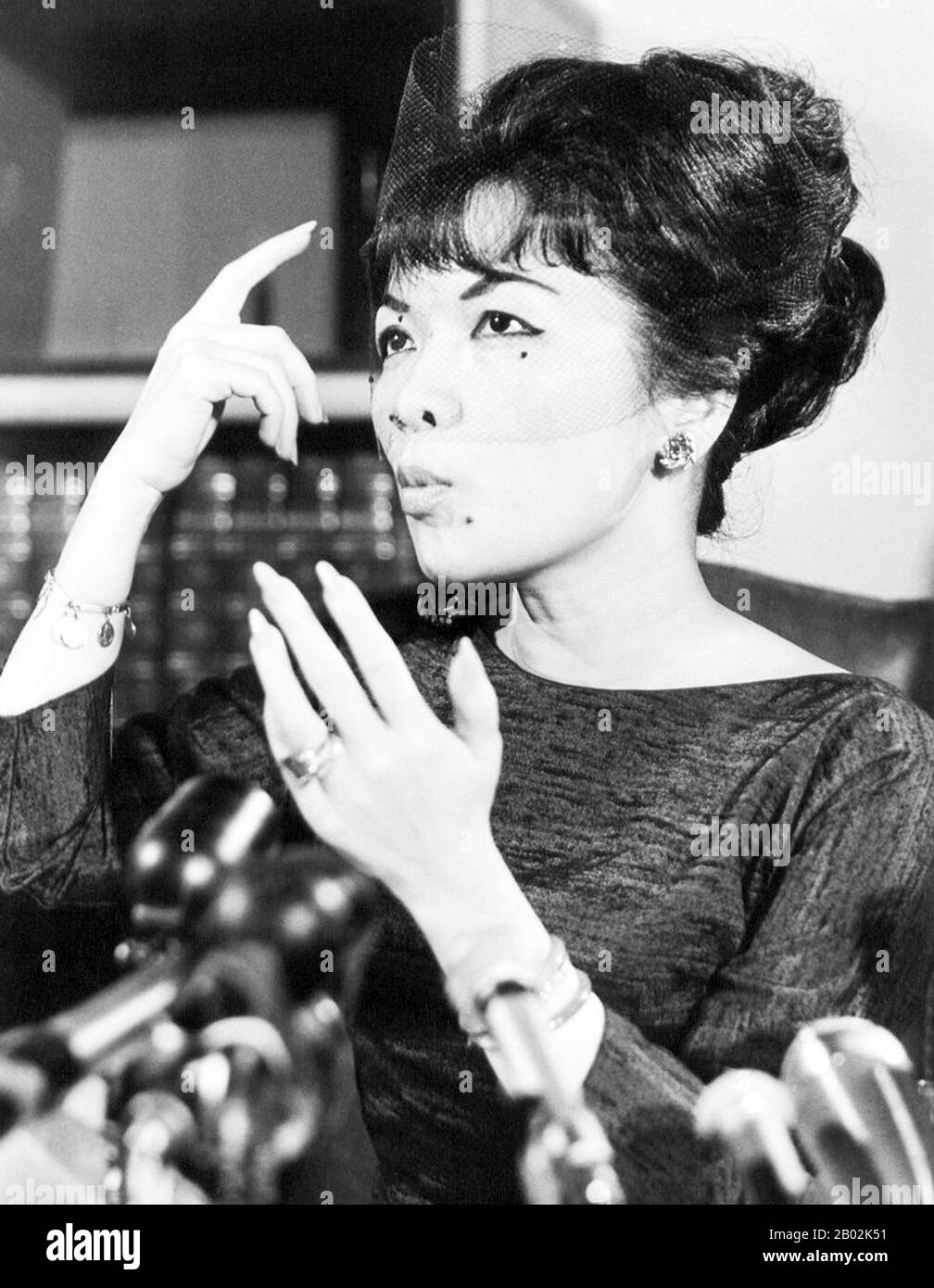 Tran Le Xuan (born April 15, 1924 in Hanoi, Vietnam), popularly known as Madame Nhu but more properly Madame Ngo Dinh Nhu, was considered the First Lady of South Vietnam from 1955 to 1963. She was the wife of Ngo Dinh Nhu, brother and chief adviser to President Ngo Dinh Diem.  As Diem was a lifelong bachelor, and because the Nhus lived in the Independence Palace, she was considered to be the First Lady. Diem often appointed relatives to high positions, so her father became the ambassador to the United States while her mother, a former beauty queen, was South Vietnam's observer at the United Na Stock Photo