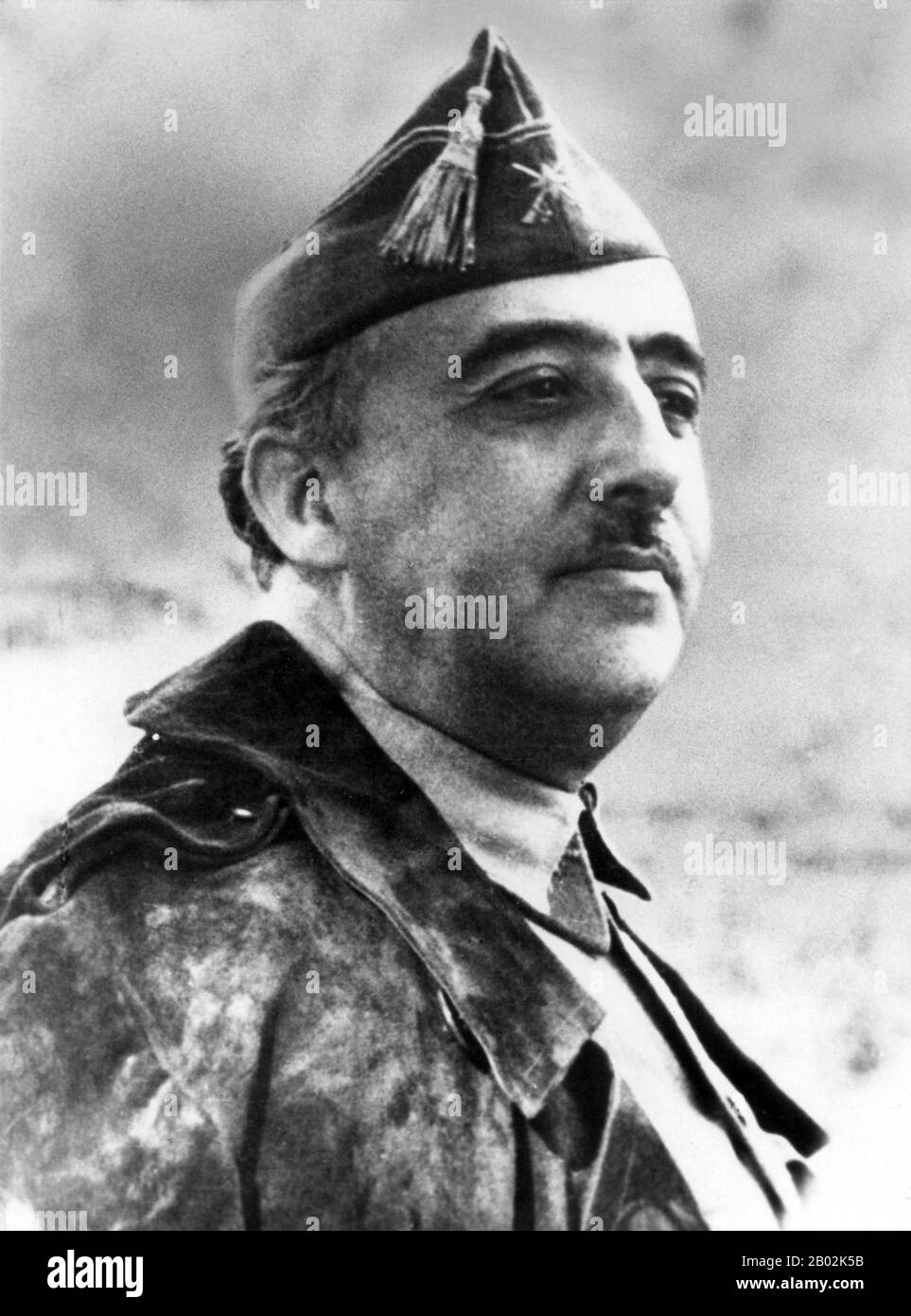 Francisco Franco Bahamonde (4 December 1892 – 20 November 1975) was the dictator of Spain from 1939 to his death in 1975.  A conservative, he was shocked when the monarchy was removed and replaced with a democratic republic in 1931. With the 1936 elections, the conservatives fell and the leftist Popular Front came to power. Looking to overthrow the republic, Franco and other generals staged a partially successful coup, which started the Spanish Civil War. With the death of the other generals, Franco quickly became his faction's only leader.  Franco received military support from local fascist, Stock Photo