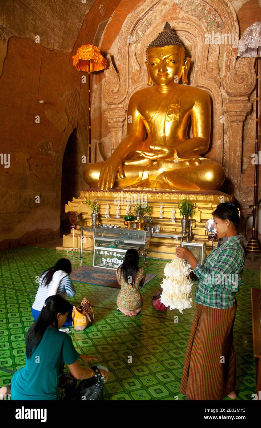 Htilominlo Temple was built during the reign of King Htilominlo (also known as Nandaungmya) in 1211. Bagan, formerly Pagan, was mainly built between the 11th century and 13th century. Formally titled Arimaddanapura or Arimaddana (the City of the Enemy Crusher) and also known as Tambadipa (the Land of Copper) or Tassadessa (the Parched Land), it was the capital of several ancient kingdoms in Burma. Stock Photo