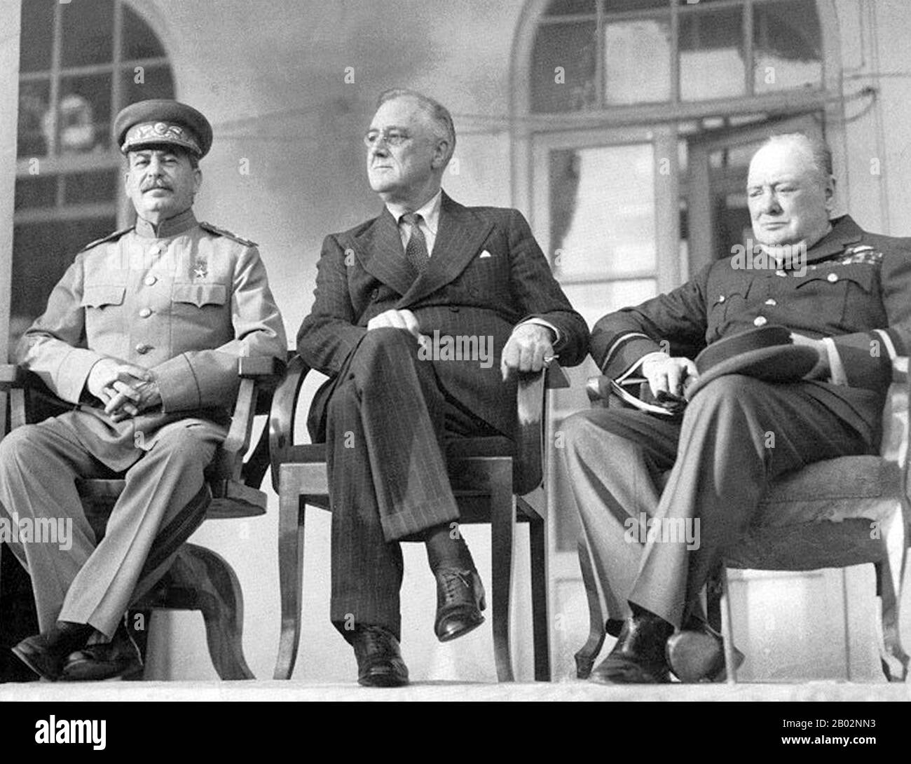 The Tehran Conference was a strategy meeting held between Joseph Stalin, Franklin D. Roosevelt, and Winston Churchill from 28 November to 1 December 1943. It was held in the Soviet Embassy in Tehran, Iran and was the first of the World War II conferences held between all of the 'Big Three' Allied leaders (the Soviet Union, the United States, and the United Kingdom).  It closely followed the Cairo Conference which had taken place on 22-26 November 1943, and preceded the 1945 Yalta and Potsdam Conferences. Although all three of the leaders present arrived with differing objectives, the main outc Stock Photo