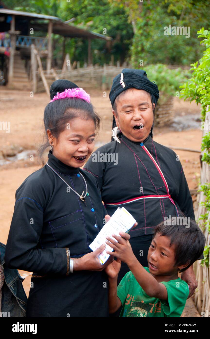 The Enn (also known as Ann or Eng) belong to the Mon-Khmer linguistic group and can be found only in a few villages to the north and west of Kyaing Tong (Kengtung) in the Shan hils of Shan State. They have lived in these hills for many centuries.  The Enn are related to their near neighbours, the Wa, Palaung and Loi, and are mostly animists and Buddhists, although a few have been converted to Christianity.  A defining characteristic of Enn women is their black teeth caused by using a black lipstick made from charred tree root and bark. Stock Photo
