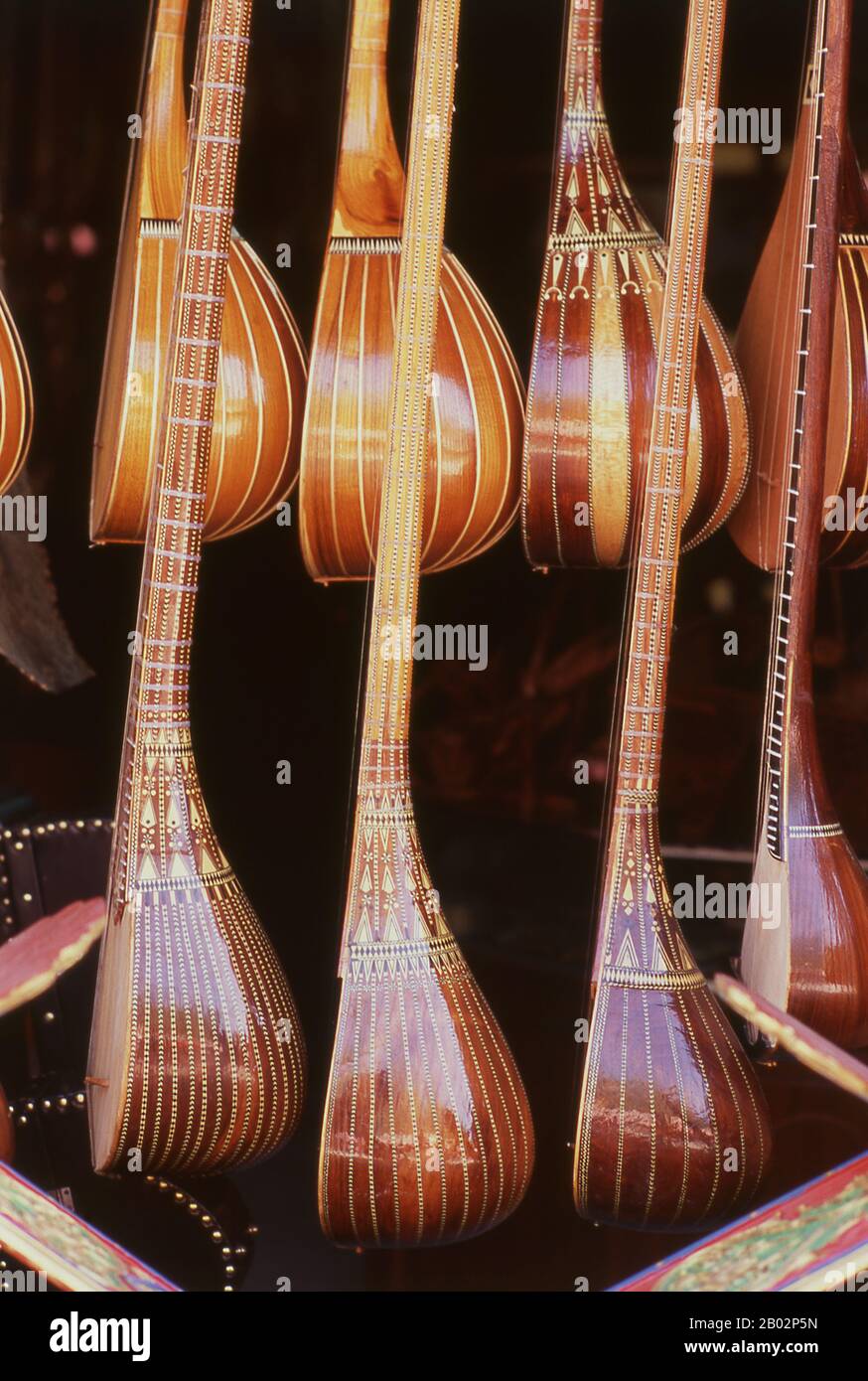 The dutar (also dotar or doutar) is a traditional long-necked two-stringed lute found in Iran and Central Asia. When played, the strings are usually plucked by the Uighurs of Western China and strummed and plucked by the Tajiks, Turkmen, and Uzbeks. The earliest mention of Kashgar occurs when a Chinese Han Dynasty (206 BCE – 220 CE) envoy traveled the Northern Silk Road to explore lands to the west. Another early mention of Kashgar is during the Former Han (also known as the Western Han Dynasty), when in 76 BCE the Chinese conquered the Xiongnu, Yutian (Khotan), Sulei (Kashgar), and a group Stock Photo