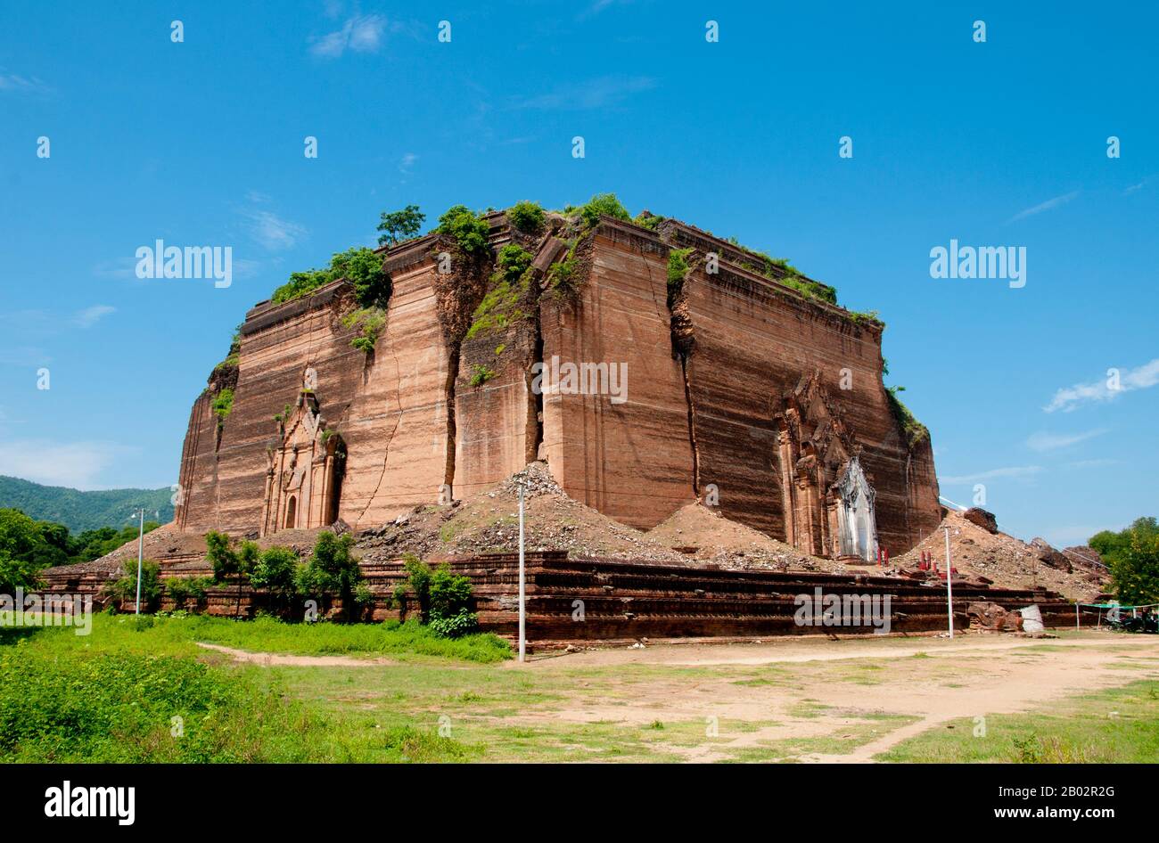 The Mingun Pahtodawgyi (Mingun Temple) was built in 1790 by King Bowdawpaya (1745 - 1819) the sixth king of the Konbaung Dyanasty. The enormous stupa was never completed and today stands at a height of 50m (164 ft). It was originally intended to be the tallest stupa in the world at a height of 150m (490 ft). Stock Photo
