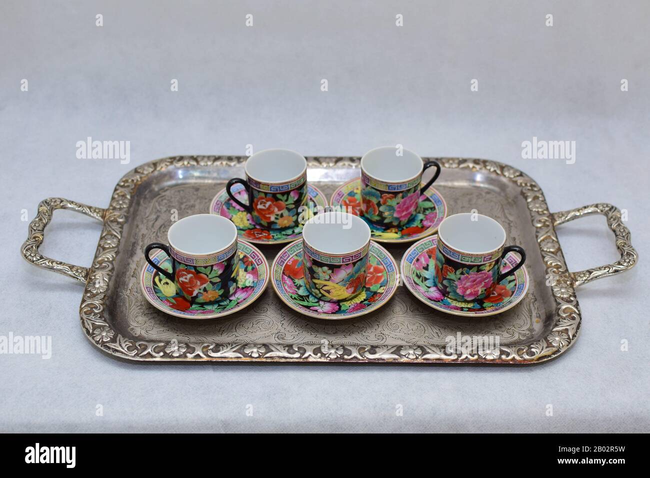 https://c8.alamy.com/comp/2B02R5W/mock-up-design-set-of-elegant-and-traditional-colorful-coffee-cup-tea-cup-on-cups-plate-drink-ware-kitchen-isolated-on-white-background-2B02R5W.jpg