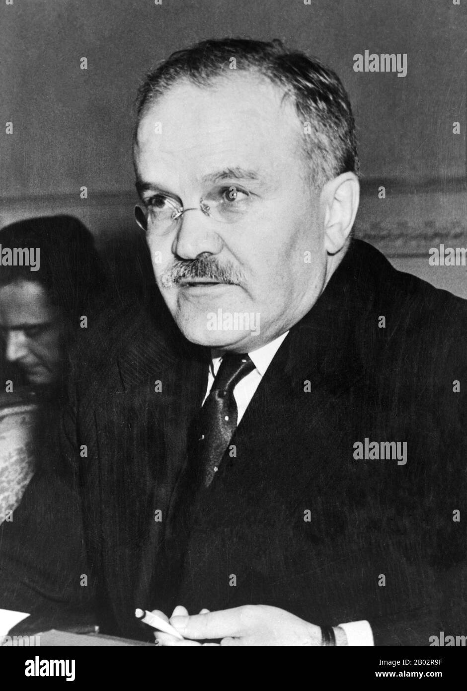 Vyacheslav Mikhailovich Molotov (9 March 1890 – 8 November 1986) was a Soviet politician and diplomat, an Old Bolshevik, and a leading figure in the Soviet government from the 1920s, when he rose to power as a protégé of Joseph Stalin.  Molotov served as Chairman of the Council of People's Commissars (Premier) from 1930 to 1941, and as Minister of Foreign Affairs from 1939 to 1949 and from 1953 to 1956. He served as First Deputy Premier from 1942 to 1957, when he was dismissed from the Presidium of the Central Committee by Nikita Khrushchev.  He retired in 1961 after several years of obscurity Stock Photo