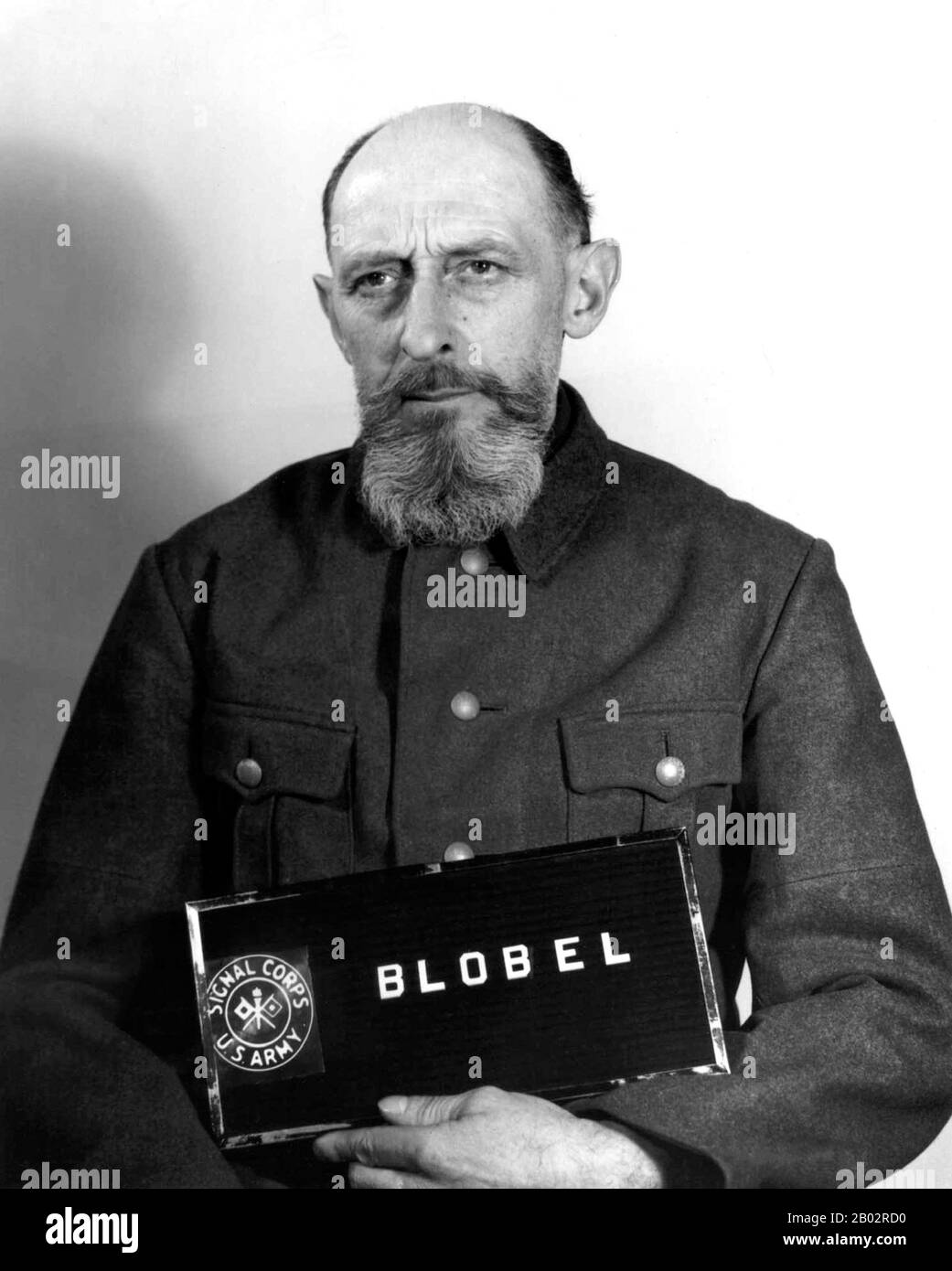 In 1933 Blobel joined the police force in Düsseldorf. In June 1934 he was recruited into the SD or Sicherheitsdienst, the security service of the SS and the Nazi Party. In June 1941 he became the commanding officer of Sonderkommando 4a of Einsatzgruppe C that was active in the Ukraine. Following Wehrmacht troops into the Ukraine, the Einsatzgruppen would be responsible for liquidating political and racial undesirables.  Blobel, in conjunction with Reichenau's and Friedrich Jeckeln's units, organized the Babi Yar massacre in late September 1941 in Kiev, where 33,771 Jews were murdered. Up to 59 Stock Photo