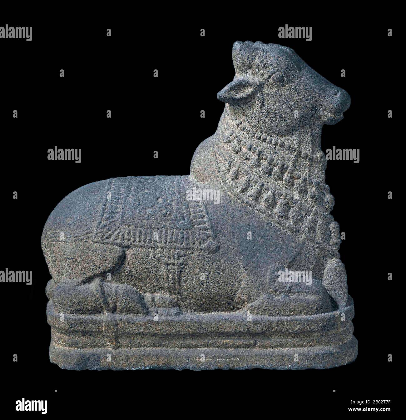 Nandi or Nandin (Tamil: நந்தி Sanskrit: नंदी) is the name for the bull which serves as the mount (Sanskrit: vāhana) of Shiva and as the gate keeper of Shiva and Parvati in Hindu mythology.  Temples venerating Shiva and Parvati display stone images of a seated Nandi, generally facing the main shrine. There are also a number of temples dedicated solely to Nandi. Stock Photo
