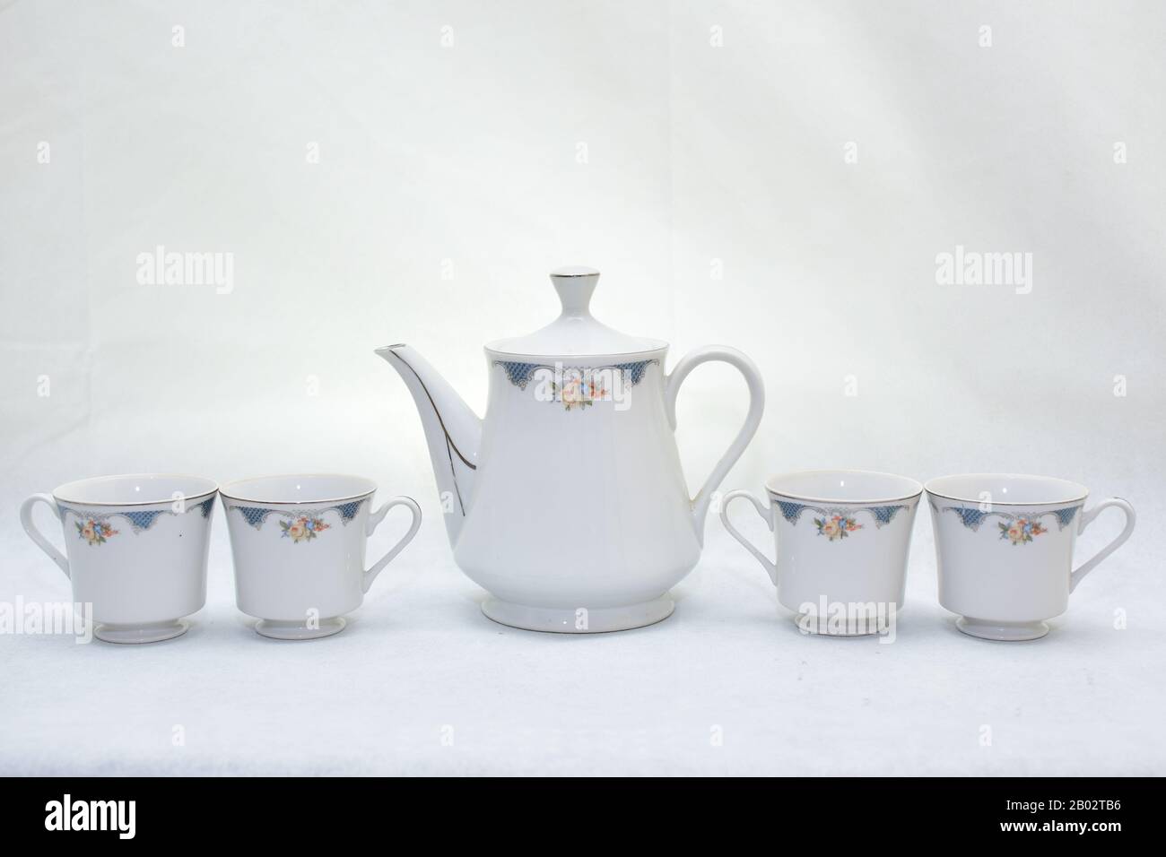 Mock Up Design Set Of Elegant And Traditional Teapot Colorful White And Blue Coffee Cup Tea Cup On Cup S Plate Beside The Hot Tea Pot Design Dr Stock Photo Alamy