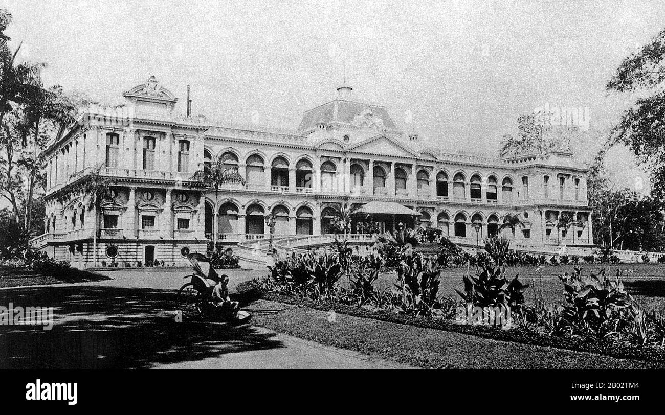 Originally the French governor's palace, then Norodom Palace, then Independence Palace, the magnificent original French building was knocked down to make way for Reunification Palace, which was built on the same site between 1962 -66. It is today a famous landmark in Ho Chi Minh City and a popular museum and tourist attraction. The present building was designed by architect Ngo Viet Thu and was the home and workplace of the President of South Vietnam during the US-Vietnam War. It was famously the site of the end of the Vietnam War during the Fall of Saigon on April 30, 1975, when a North Vietn Stock Photo