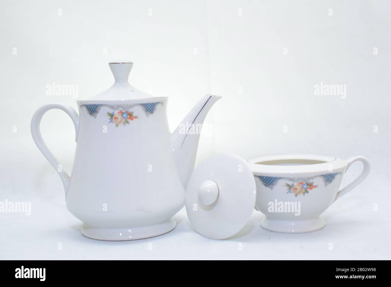 Download Mock Up Design Set Of Elegant And Traditional Teapot Colorful White And Blue Coffee Cup Tea Cup On Cup S Plate Beside The Hot Tea Pot Design Dr Stock Photo Alamy PSD Mockup Templates