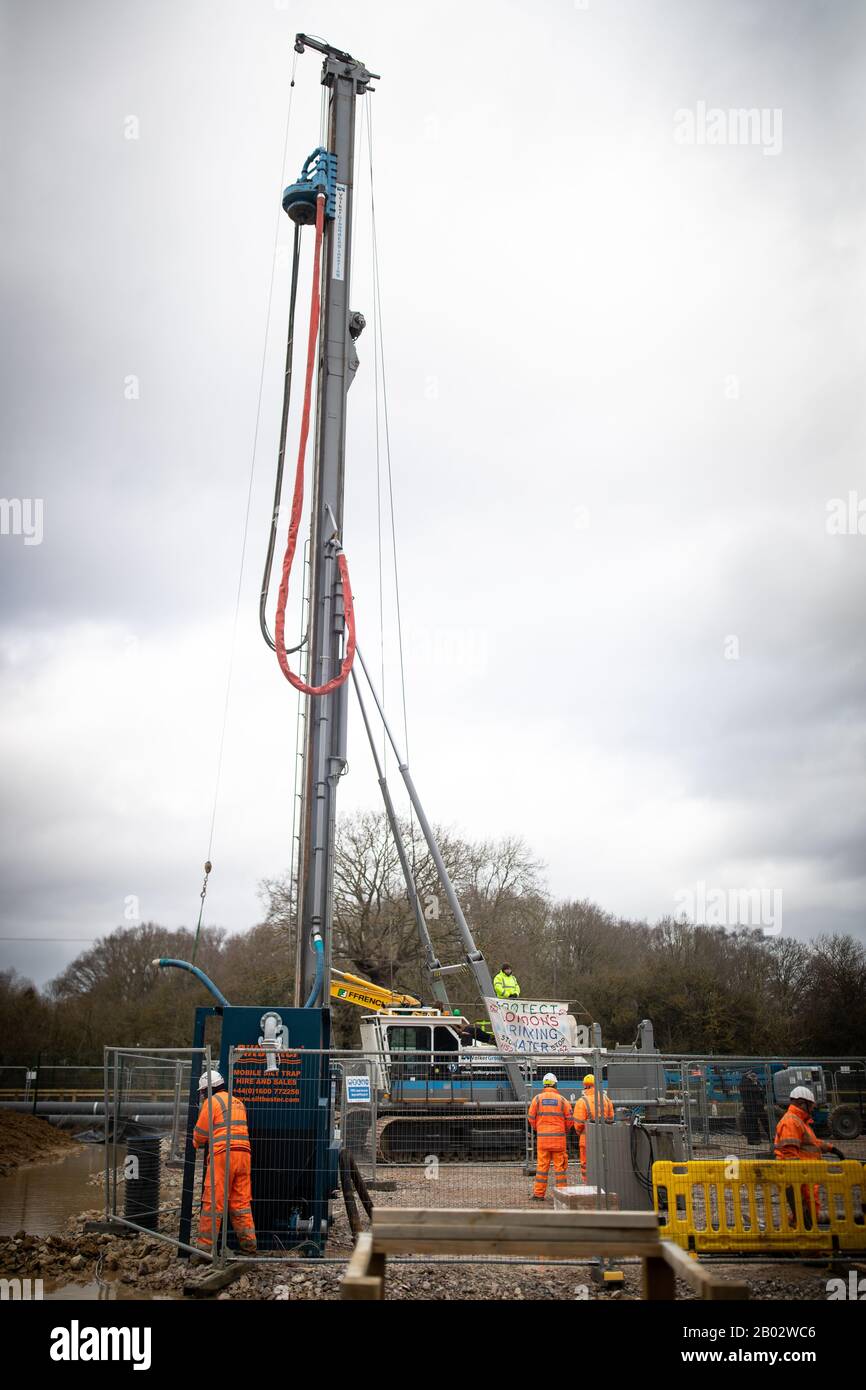 HS2 protestors including former paralympian James Brown occupy a drilling platform used to drill the aquifer in Uxbridge, London. Stock Photo