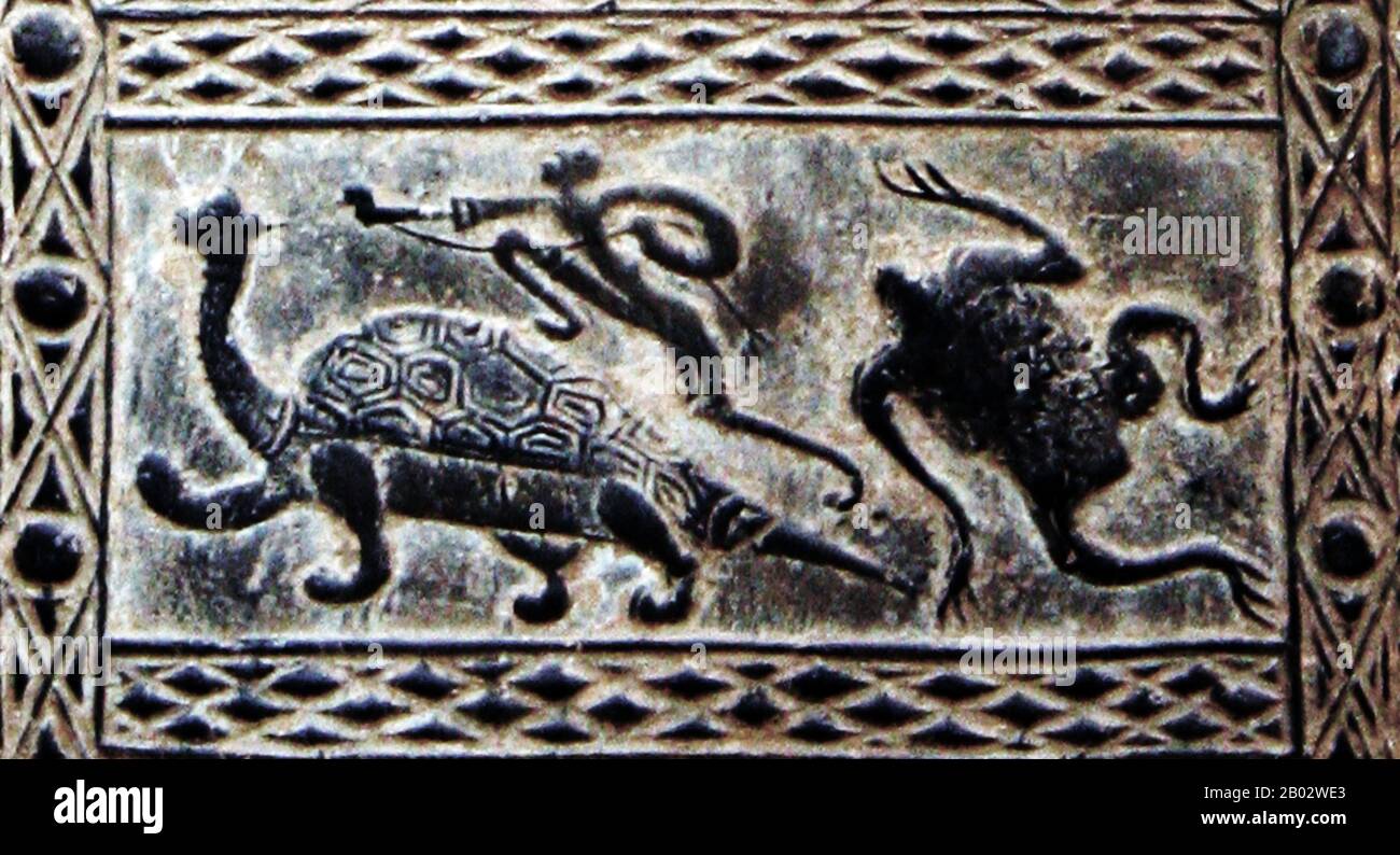 A pottery tile of the Han Dynasty, depicting hunting and battle scenes containing emblematic figures of the 'five cardinal directions' (the four cardinal directions plus the centre).  The Four Symbols (Chinese: 四象; pinyin: Sì Xiàng) are four mythological creatures in the Chinese constellations. They are the Azure Dragon, of the East, the Vermilion Bird of the South, the White Tiger of the West, and the Black Turtle of the North. Each one of them represents a direction and a season, and each has its own individual characteristics and origins. Symbolically and as part of spiritual and religious Stock Photo