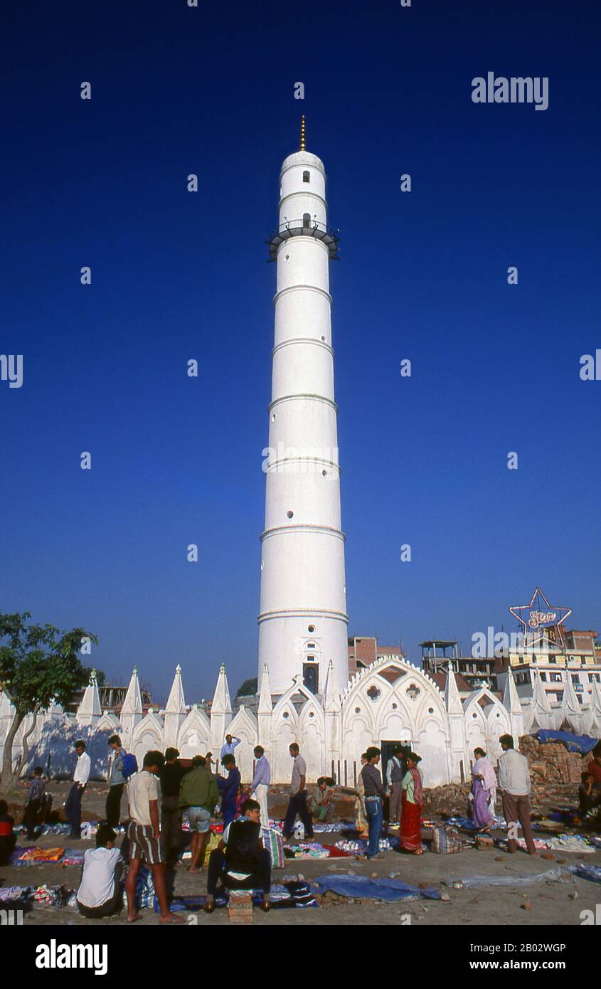 The thin white Bhimsen Tower, also called Dharahara or Bhimsen Stambha (stambha meaning 'pillar') collpased during the 2015 earhquake that shook Nepal. The 60 metre high tower was built in 1824 by Prime Minister Bhimsen Thapa as a watchtower; the construction was based more on a whim than military necessity. Originally there were two towers, but the other collapsed in 1832. Stock Photo