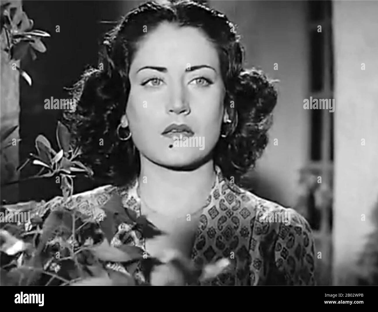 Asmahan was an Arab Druze singer and actress of Syrian origins who lived in Egypt. Having immigrated to Egypt in childhood, her family knew the composer Dawood Hosni, and she sang the compositions of Mohamed El Qasabgi and Zakariyya Ahmad. She also sang the compositions of Mohammed Abdel Wahab and her brother Farid al-Atrash, a then rising star musician in his own right.  Hers was the only female voice in Arab music to pose serious competition to that of Umm Kulthum, who is considered to be one of the Arab world's most distinguished singers of the 20th century. Her mysterious death in an autom Stock Photo