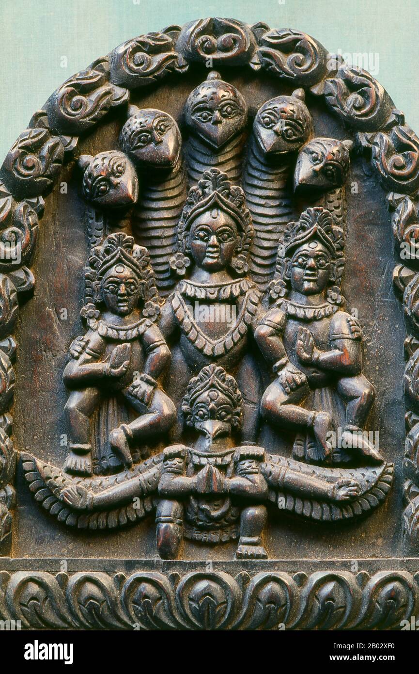 Vishnu (Sanskrit विष्णु Viṣṇu) is the Supreme god in the Vaishnavite tradition of Hinduism. Smarta followers of Adi Shankara, among others, venerate Vishnu as one of the five primary forms of God.  The Vishnu Sahasranama declares Vishnu as Paramatma (supreme soul) and Parameshwara (supreme God). It describes Vishnu as the All-Pervading essence of all beings, the master of - and beyond - the past, present and future, one who supports, sustains and governs the Universe and originates and develops all elements within. Vishnu governs the aspect of preservation and sustenance of the universe, so he Stock Photo