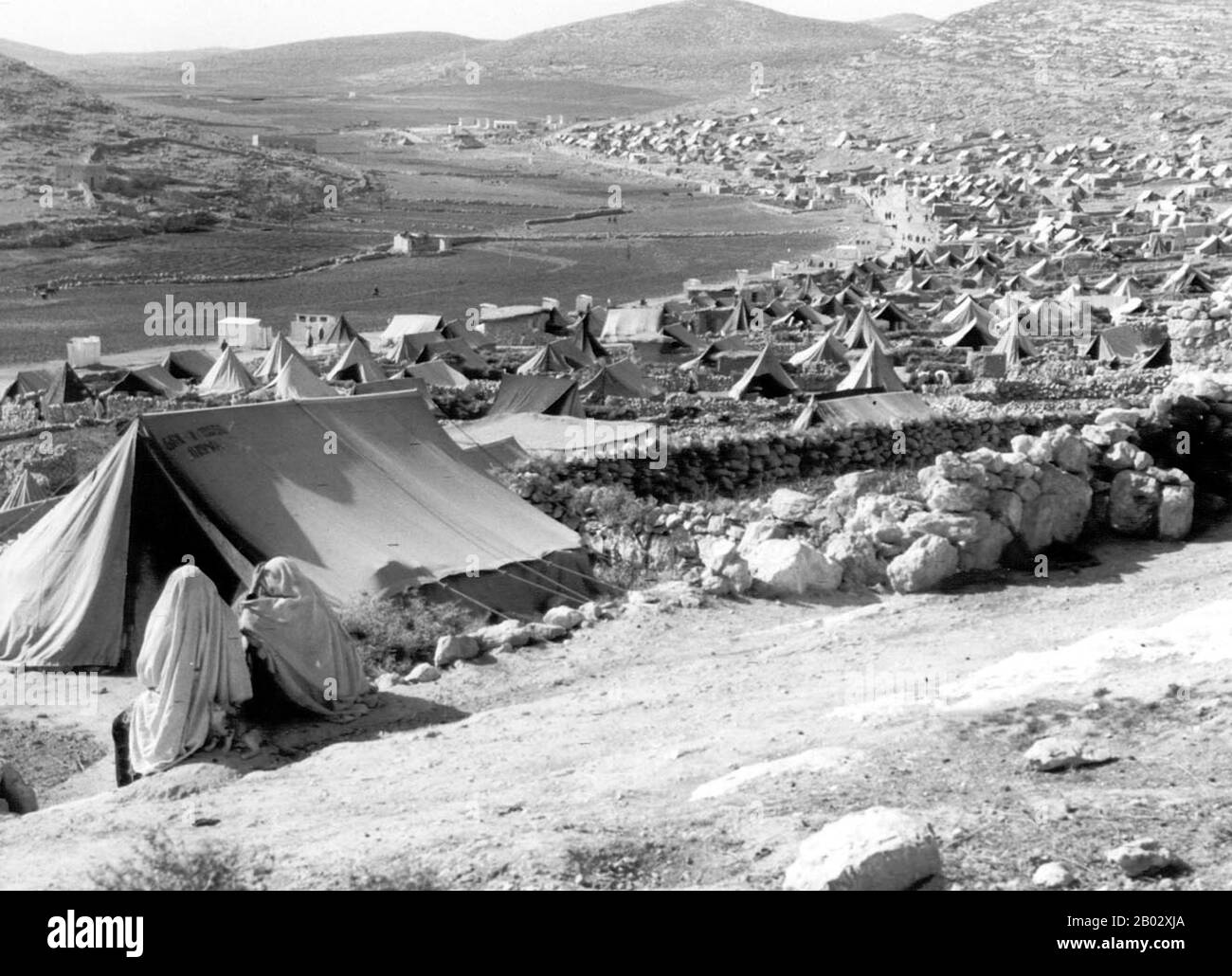 The 1948 Palestinian exodus, known in Arabic as the Nakba (Arabic: an-Nakbah, lit.'catastrophe'), occurred when more than 700,000 Palestinian Arabs fled or were expelled from their homes, during the 1947–1948 Civil War in Mandatory Palestine and the 1948 Arab–Israeli War.  The exact number of refugees is a matter of dispute, but around 80 percent of the Arab inhabitants of what became Israel (50 percent of the Arab total of Mandatory Palestine) left or were expelled from their homes.  Later in the war, Palestinians were forcibly expelled as part of 'Plan Dalet' in a policy of 'ethnic cleansing Stock Photo