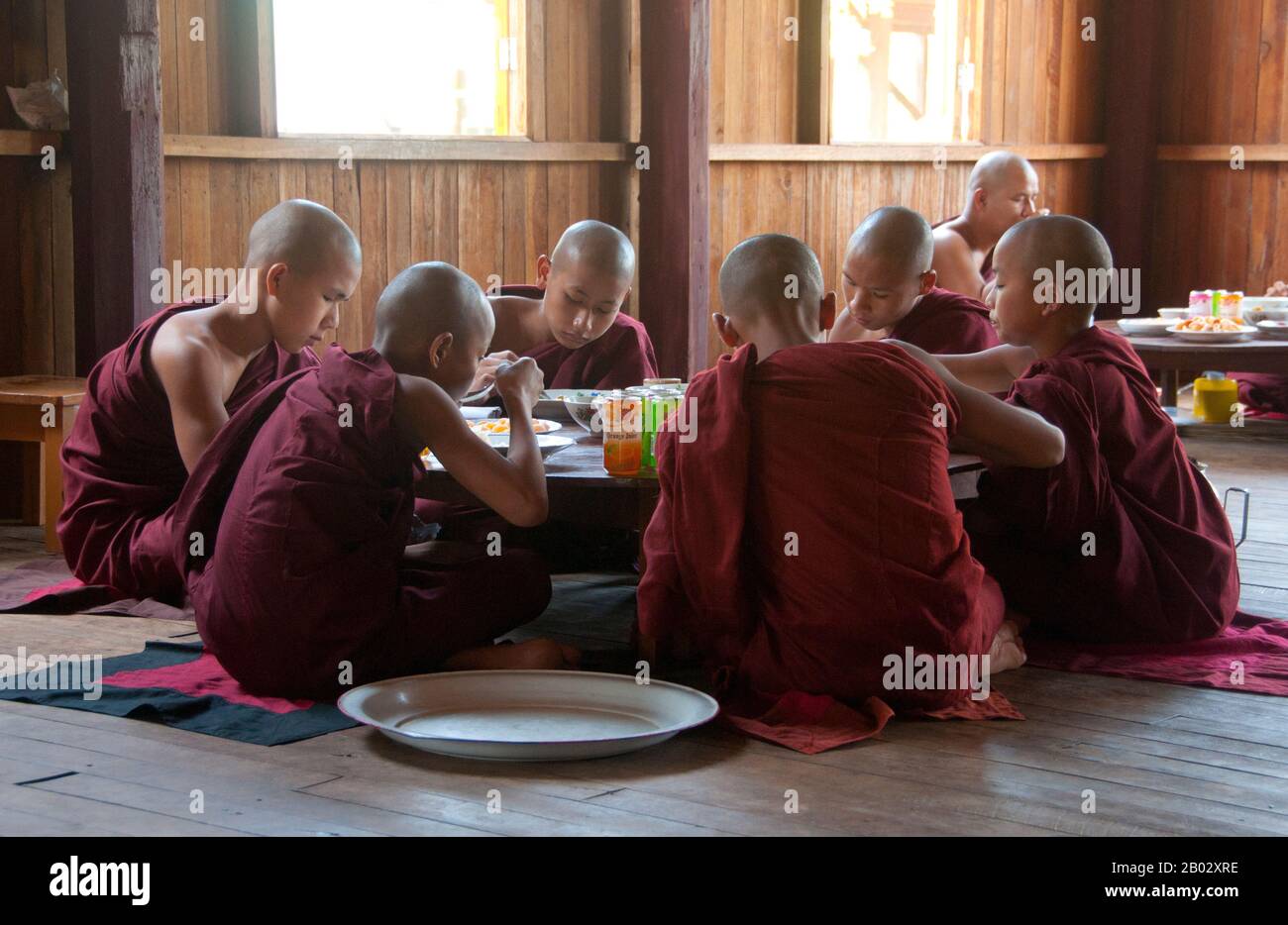 Buddhist monks collect alms—food prepared by devotees and