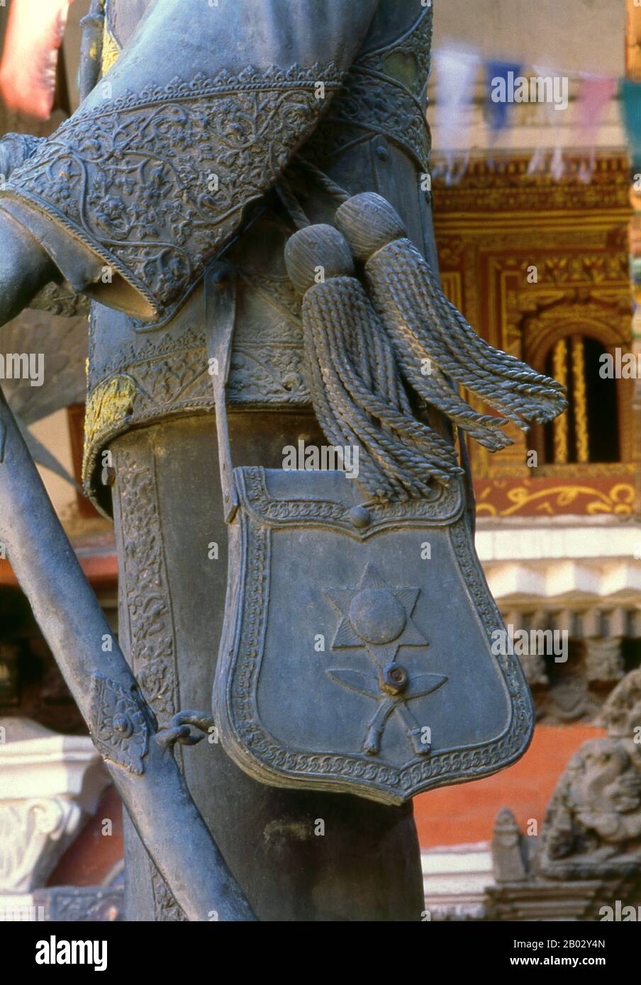 Rudravarna Mahavihara, or Oku Bahal, was built in the mid-17th century. The temple is located around a courtyard which overflows with chaitya and metal figures of all kinds and sizes. There are massive Garudas, elephants, peacocks, figures of praying worshippers and a statue of Juddha Shumsher Rana, who granted the temple generous restoration aid after the earthquake of 1934.  Juddha Shumsher Jung Bahadur Rana (Narayanhity Palace, Kathmandu, 19 April 1875 – Dehradun, India, 20 November 1952) was the Prime Minister of Nepal from 1 September 1932 to 29 November 1945 as the head of the Rana Dynas Stock Photo