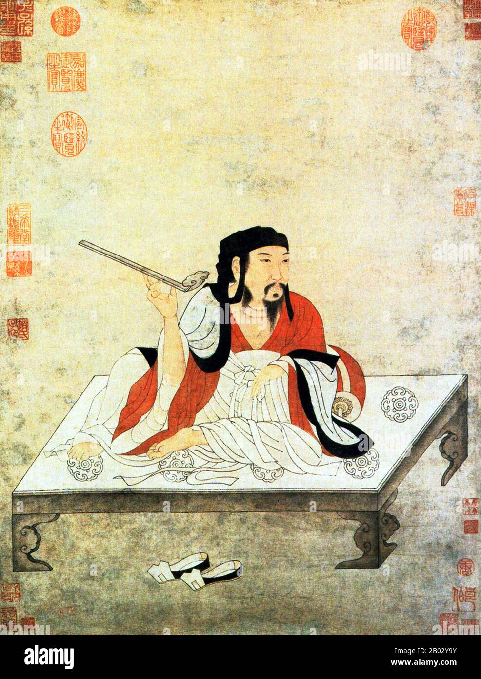 Zhuge Liang (CE 181-234) was Chancellor of Shu Han during the Three Kingdoms period of Chinese history. He is often recognised as the greatest and most accomplished strategist of his era. Often depicted wearing a robe and holding a fan made of crane feathers, Zhuge was not only an important military strategist and statesman; he was also an accomplished scholar and inventor.  His reputation as an intelligent and learned scholar grew even while he was living in relative seclusion, earning him the nickname Wolong (literally Crouching Dragon). Zhuge is an uncommon two-character compound family nam Stock Photo