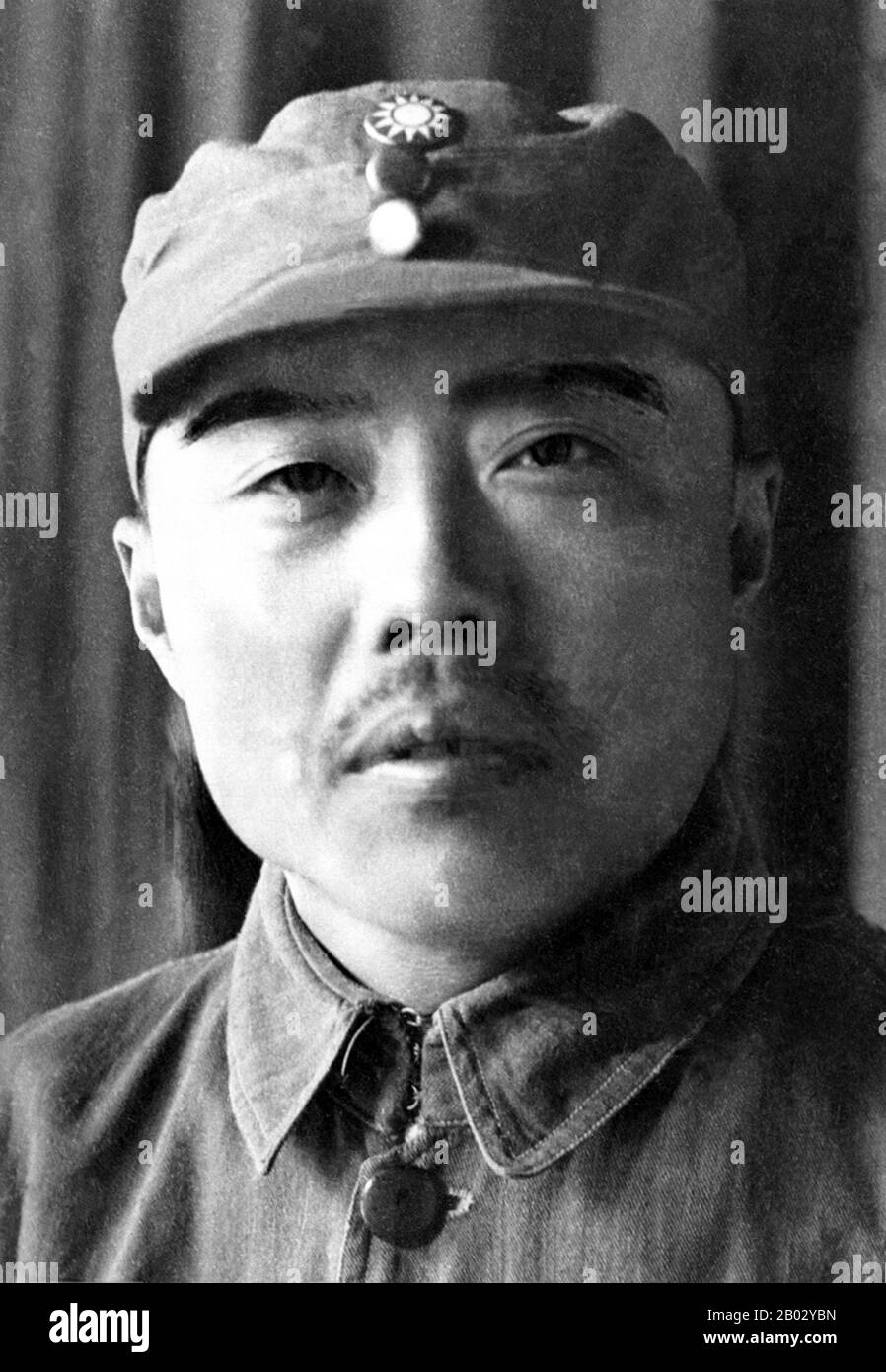 Initially a labor organizer, he went on to serve in the Communist Party of China political and military leadership during the civil war between the Nationalists (Guomindang or Kuomintang) and the Communists. He held high office during the CCP's Jiangxi Soviet period (1931–1934).  In October 1934, at the beginning of the Long March, Xiang stayed behind to fight a rearguard action that would allow the marchers to get out of the ring of surrounding Nationalist forces. The marchers, with Mao Zedong as their leader, went on to Yan'an, while Xiang remained in the Jiangxi region, coordinating guerril Stock Photo