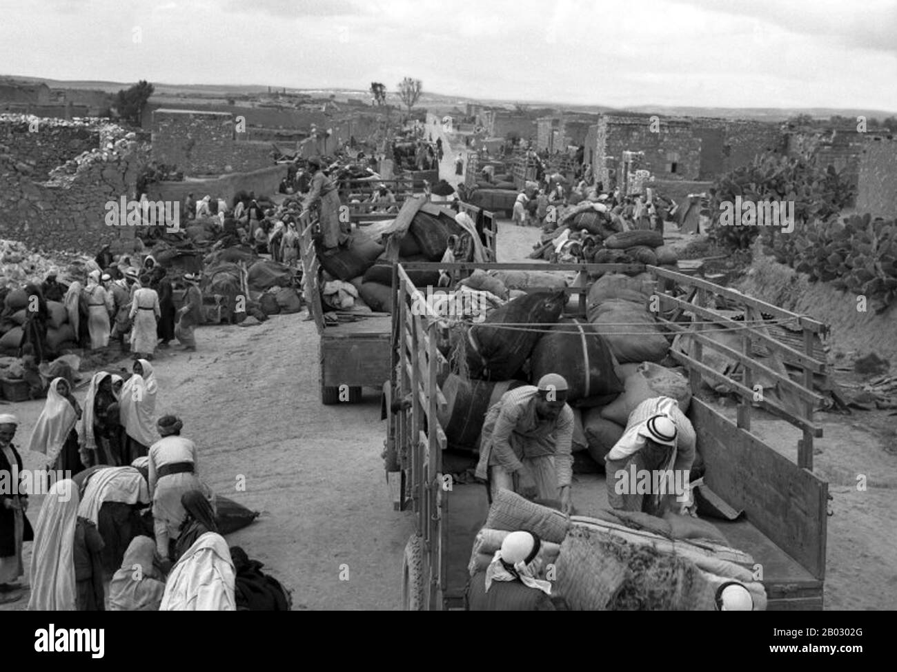 The 1948 Palestinian exodus, known in Arabic as the Nakba (Arabic: al-Nakbah, lit.'catastrophe'), occurred when more than 700,000 Palestinian Arabs fled or were expelled from their homes, during the 1947–1948 Civil War in Mandatory Palestine and the 1948 Arab–Israeli War.  The exact number of refugees is a matter of dispute, but around 80 percent of the Arab inhabitants of what became Israel (50 percent of the Arab total of Mandatory Palestine) left or were expelled from their homes.  Later in the war, Palestinians were forcibly expelled as part of 'Plan Dalet' in a policy of 'ethnic cleansing Stock Photo