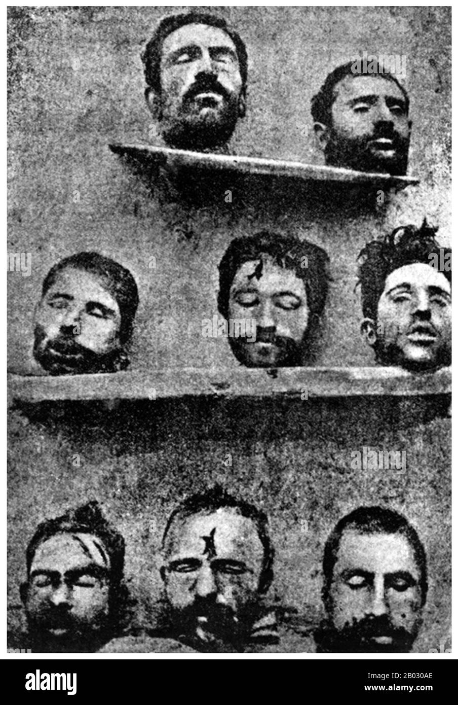 Turkey / Armenia: 'The Heads of Eight Armenian Professors Massacred by the Turks', Amenun Tarets'uyts'e (Armenian journal), 1921. The Armenian Genocide refers to the deliberate and systematic destruction of the Armenian population of the Ottoman Empire during and just after World War I. It was implemented through wholesale massacres and deportations, with the deportations consisting of forced marches under conditions designed to lead to the death of the deportees. The total number of resulting Armenian deaths is generally held to have been between one and one and a half million. Stock Photo